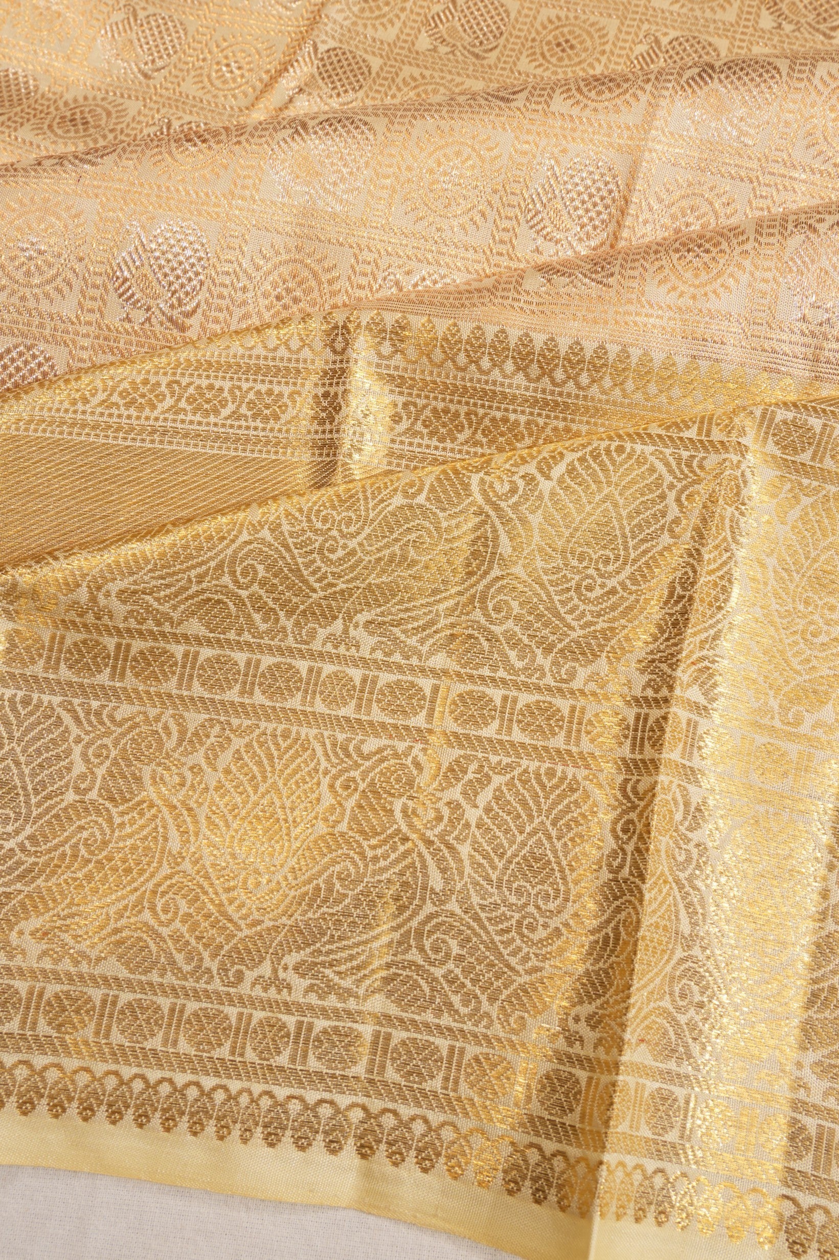 Kanchipuram Silk Checks And Butta Cream Saree