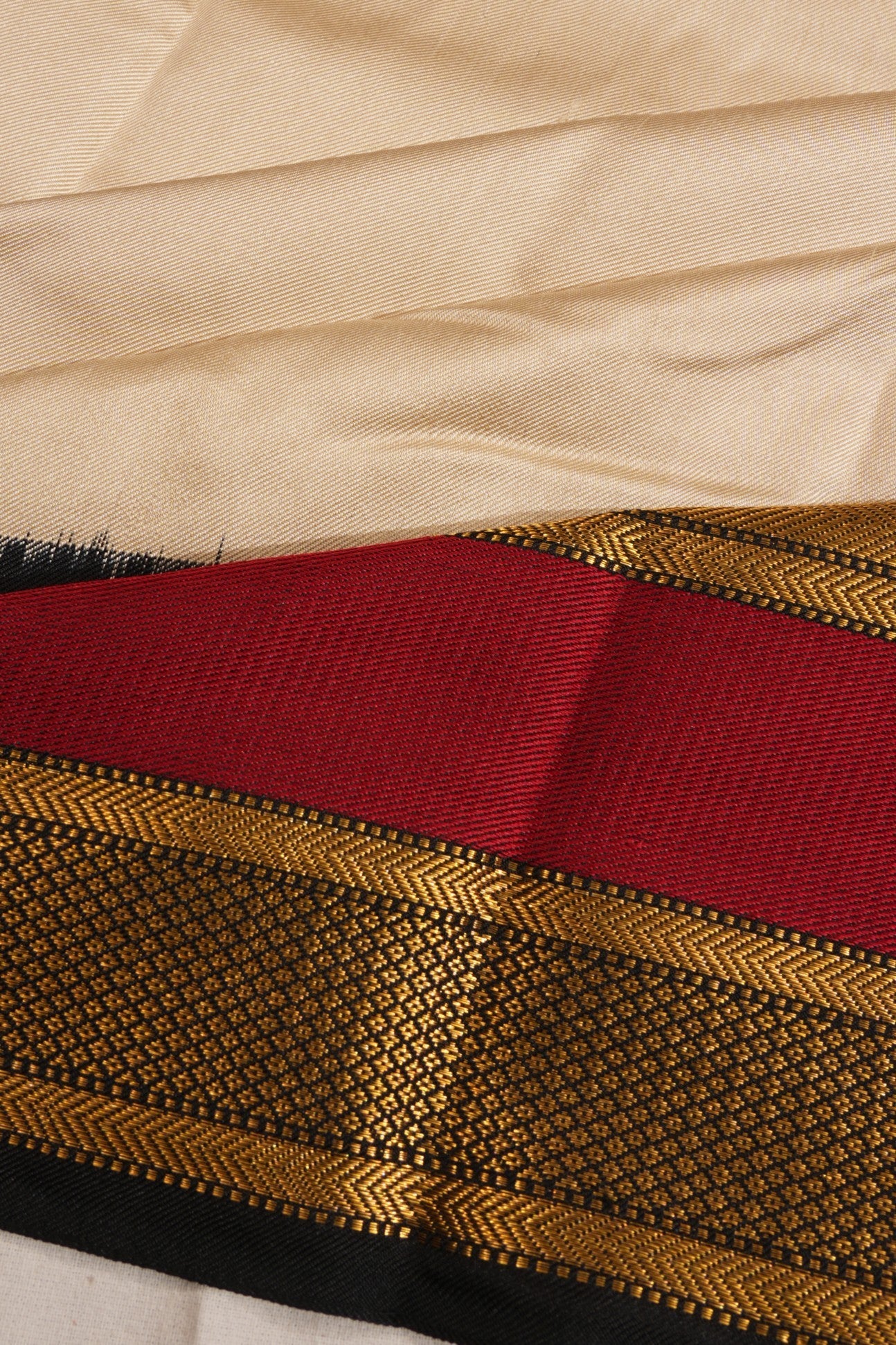 Kanchipuram Silk Twill Cream Saree With Ikat Border And Pallu
