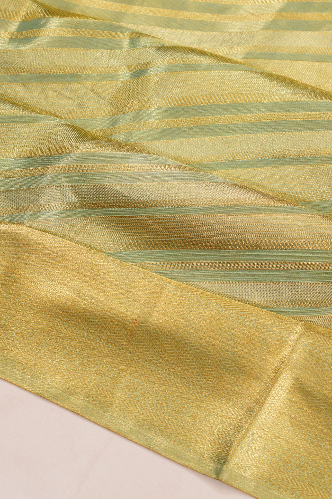 Taranga Kanchi Silk Tissue Diagonal Lines Sky Blue Saree