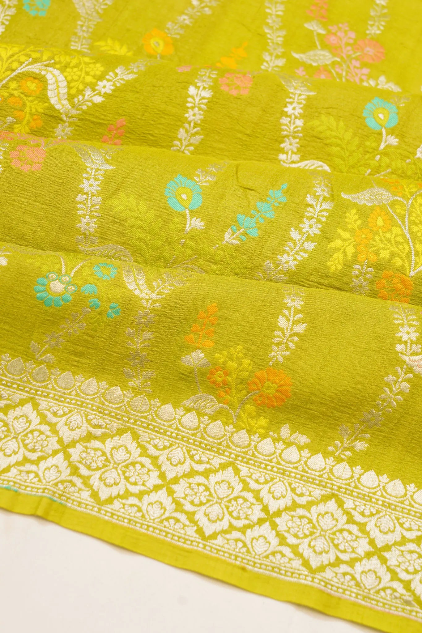 banarasi-tussar-georgette-jaal-mehendi-green-saree-1214950661