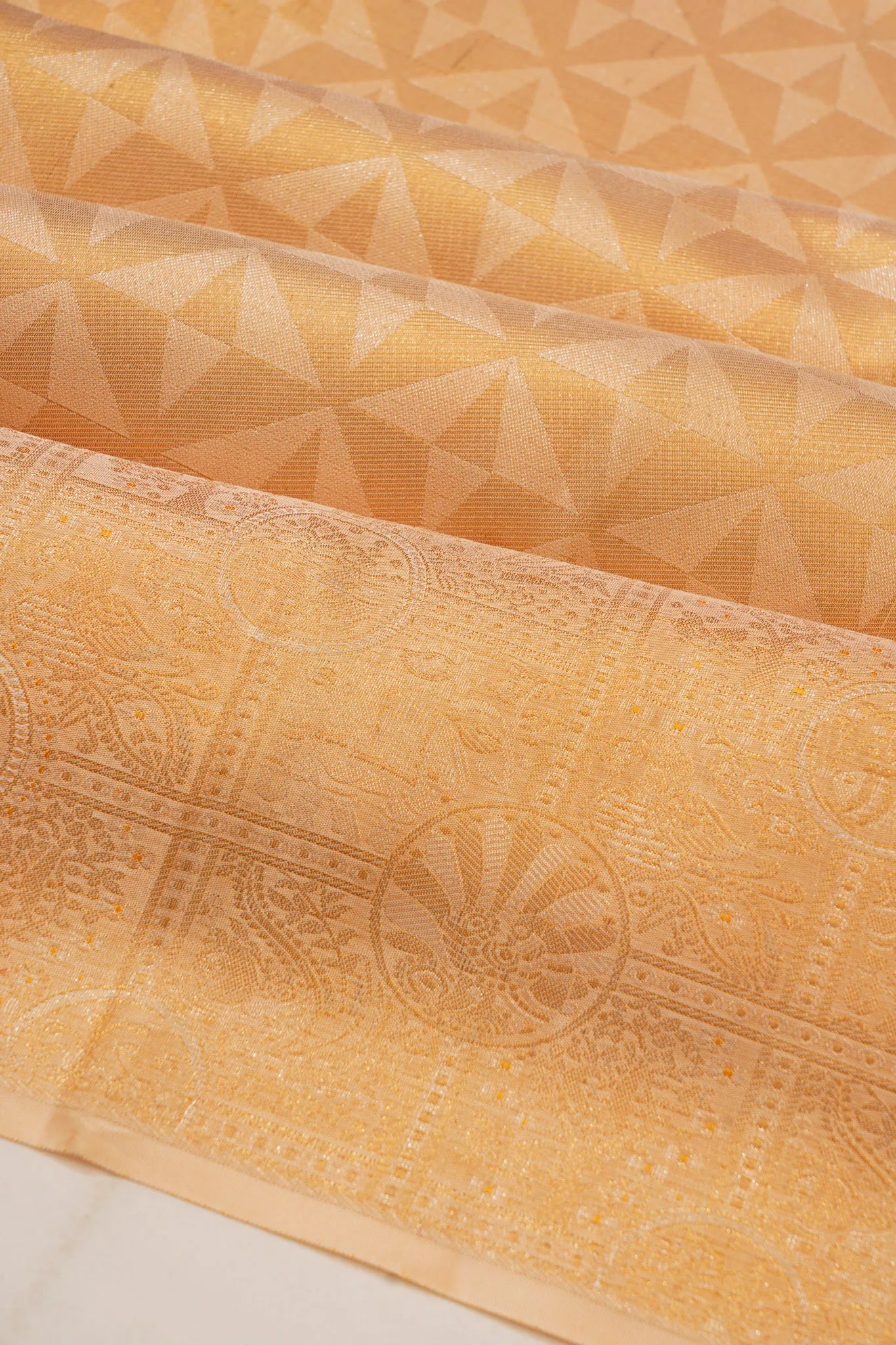 Kanchipuram Silk Tissue Geometrical Brocade Pastel Orange Saree