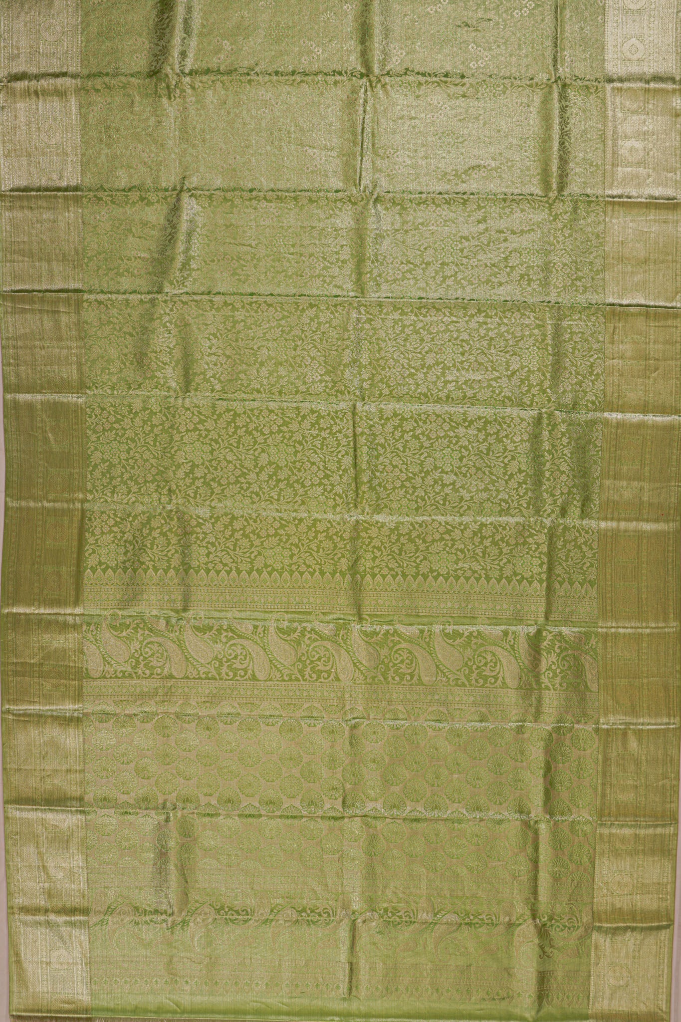Taranga Kanchi Silk Tissue Brocade Green Saree