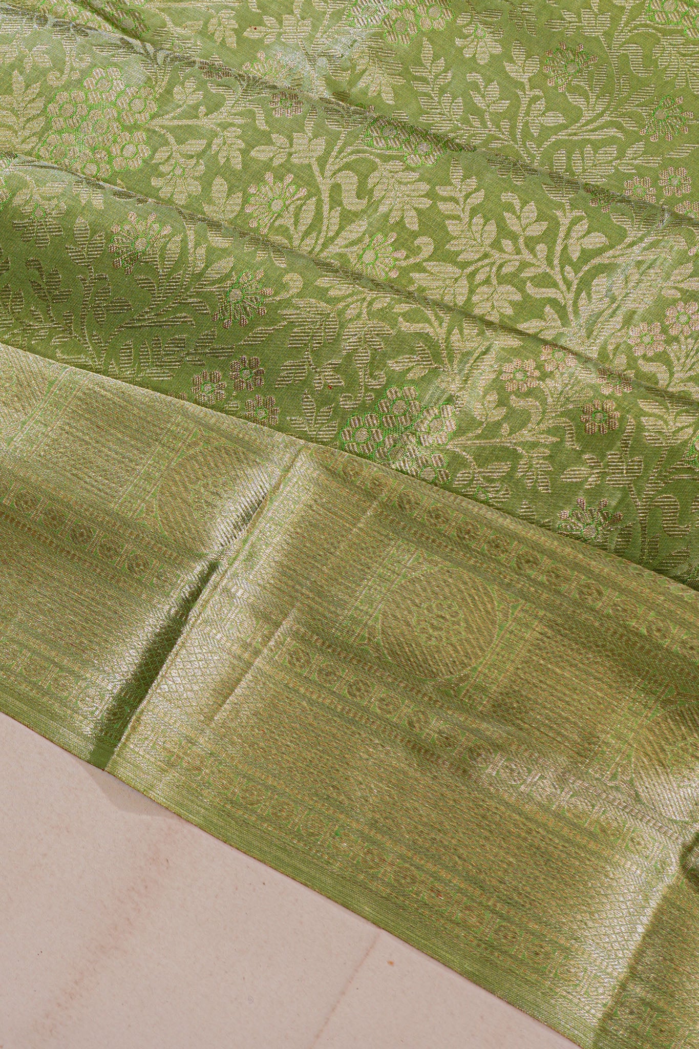 Taranga Kanchi Silk Tissue Brocade Green Saree