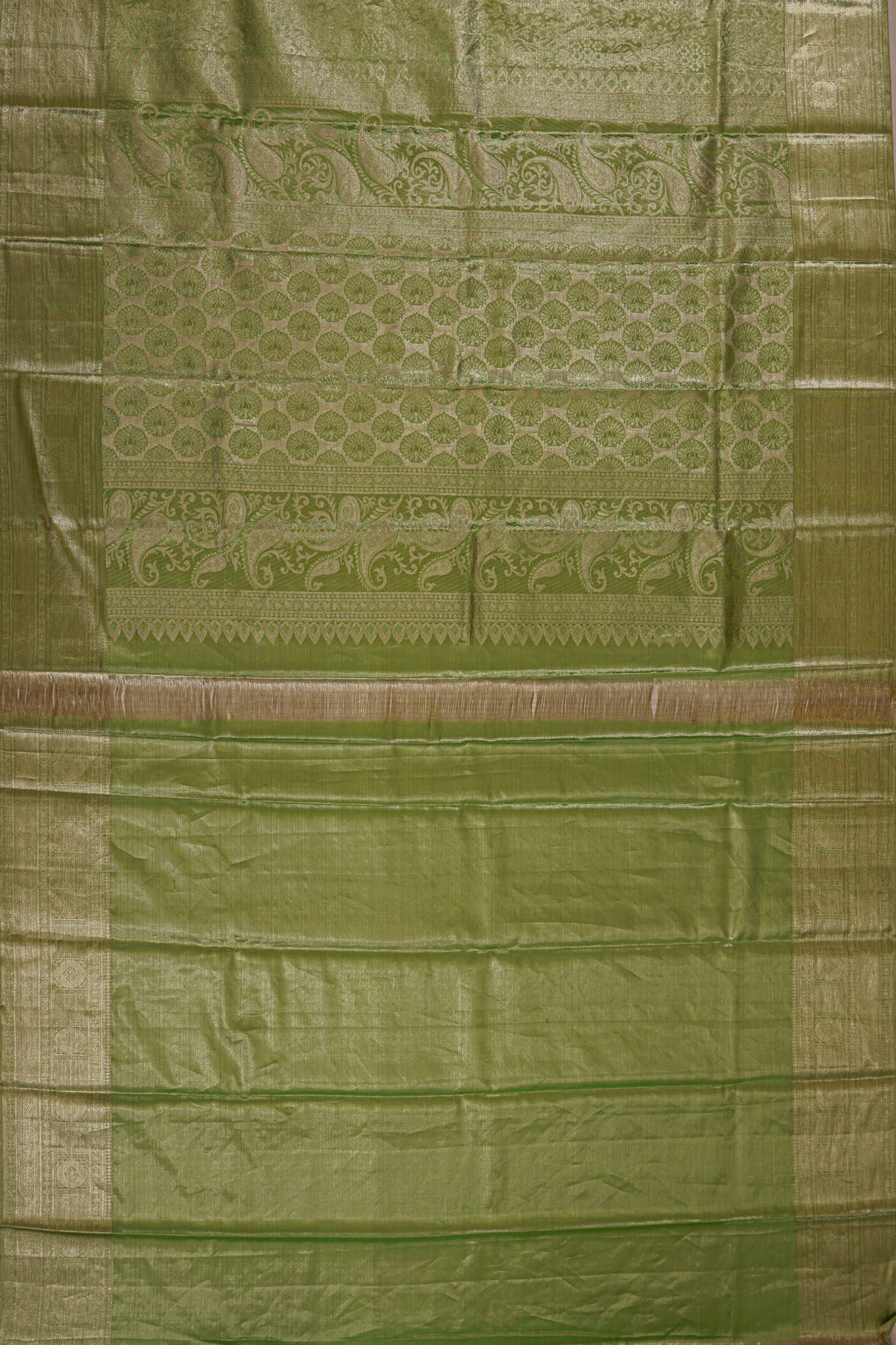 Taranga Kanchi Silk Tissue Brocade Green Saree
