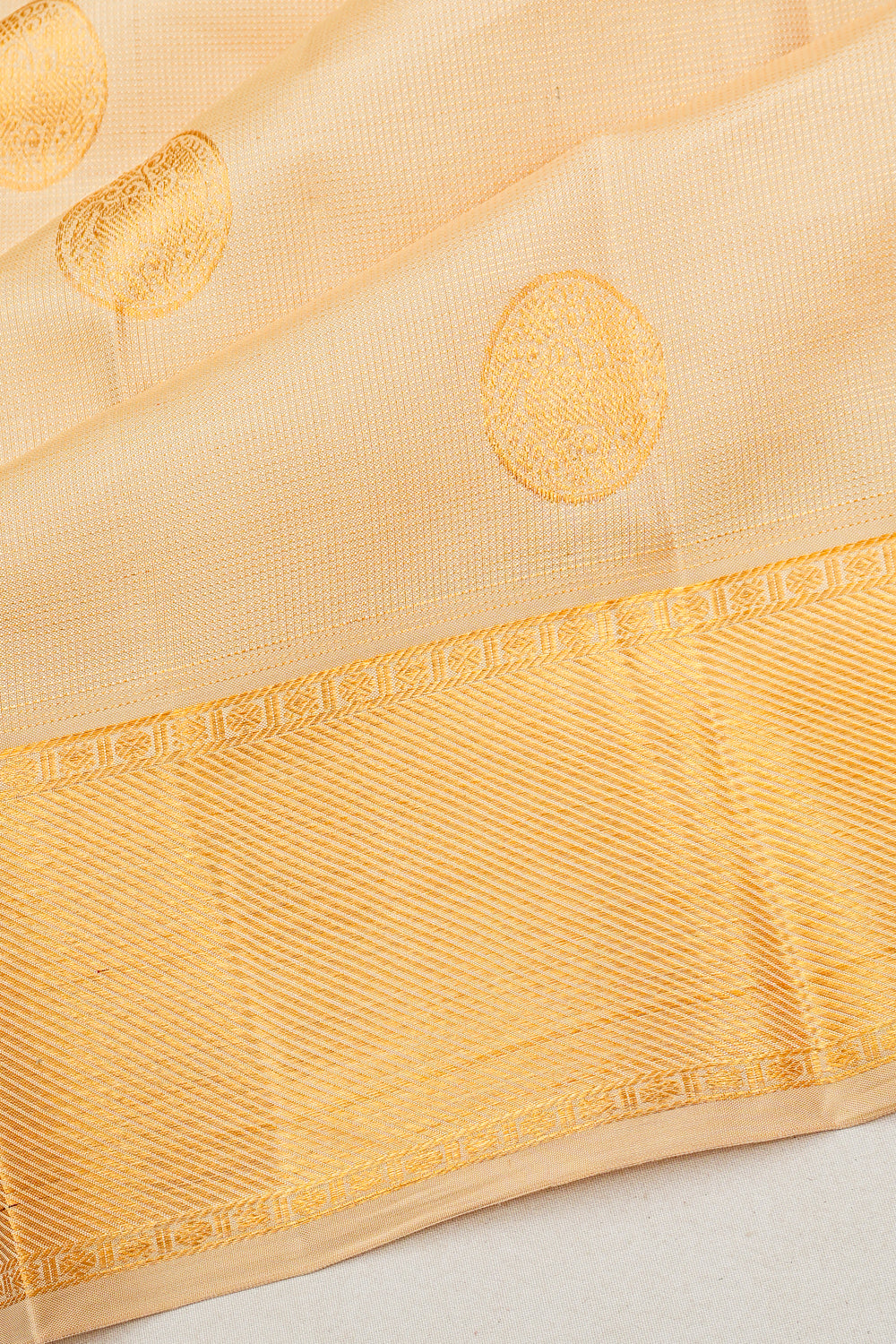 Kanchipuram Silk Brocade And Butta Cream Saree