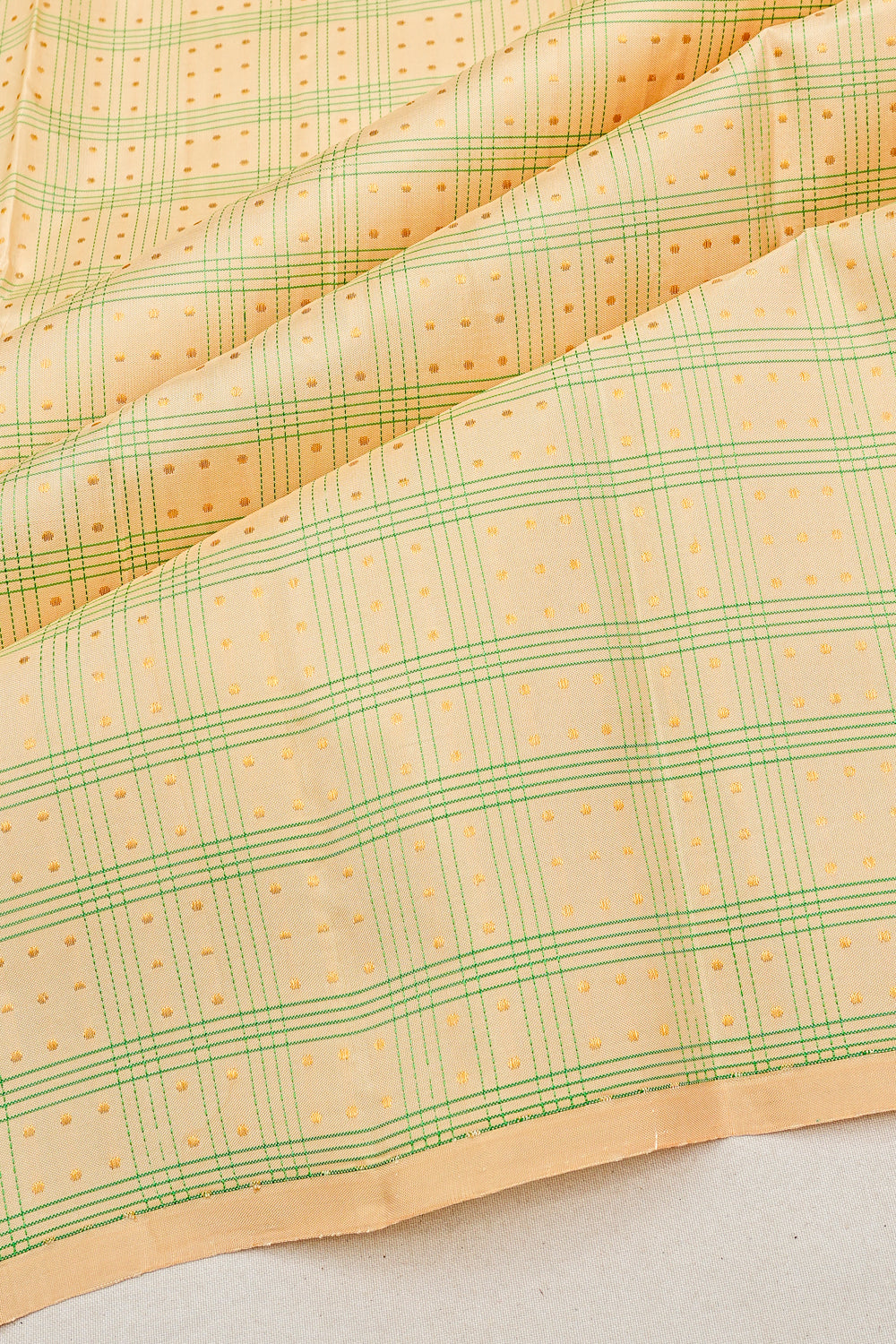 Kanchipuram Silk Checks And Butta Cream Saree
