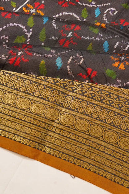 kanchipuram-silk-ikat-black-saree-1215018745