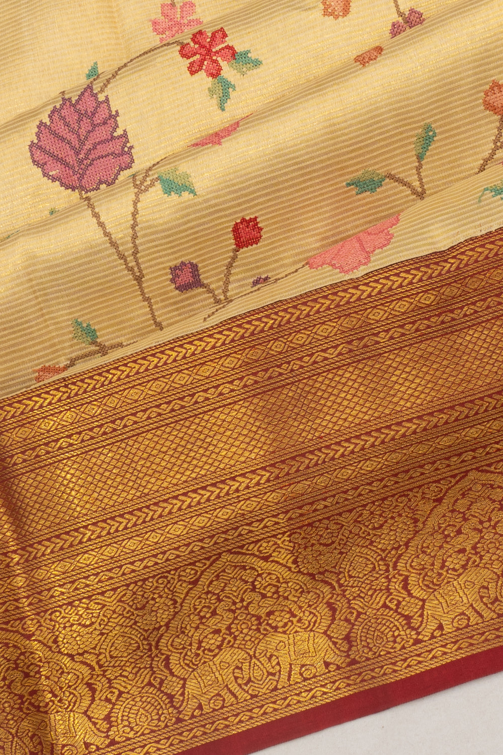 Kanchipuram Silk Oosi Lines And Embroidery Cream Saree