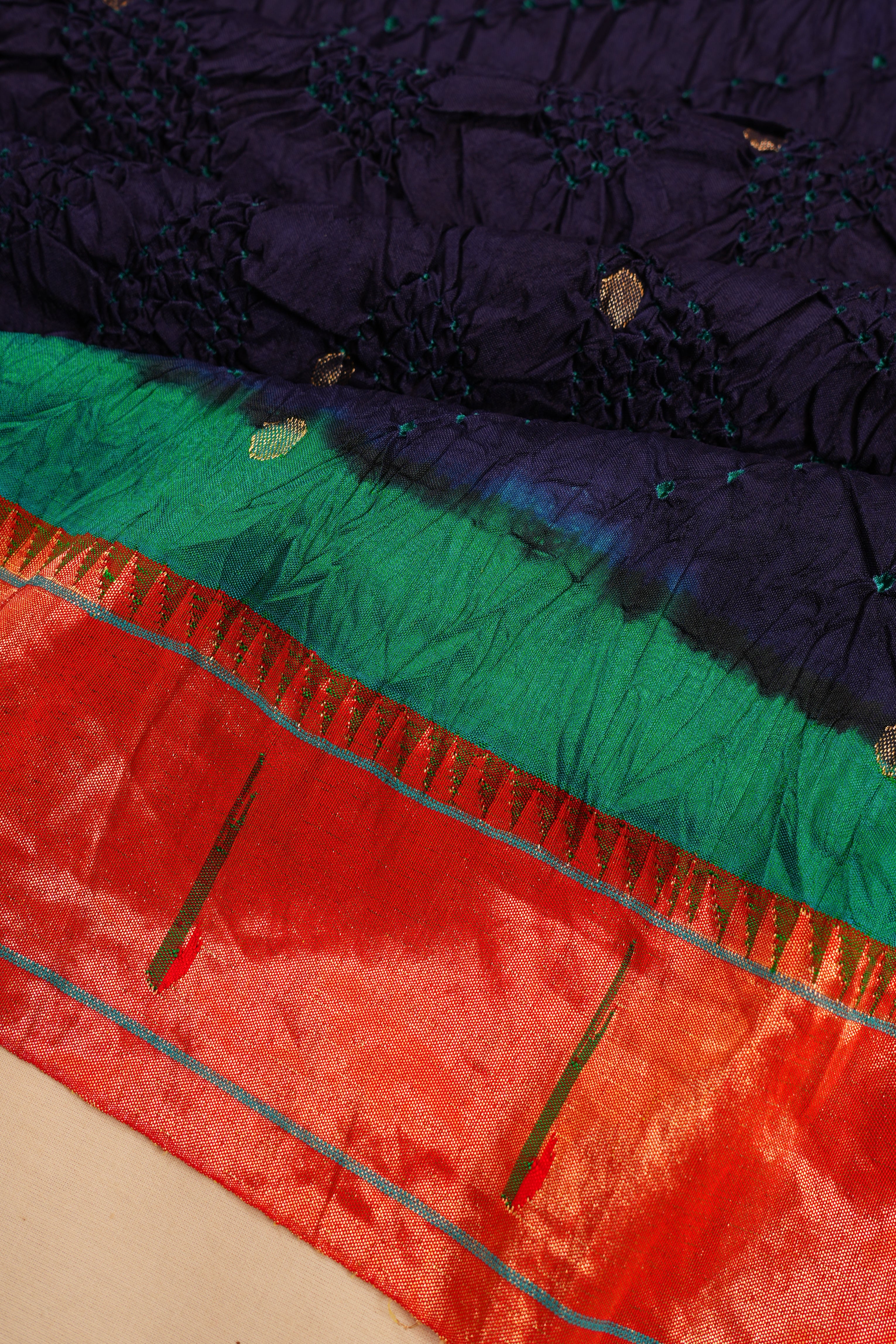 Paithani Silk Bandhani And Butta Dark Blue Saree With Single Muniya Border