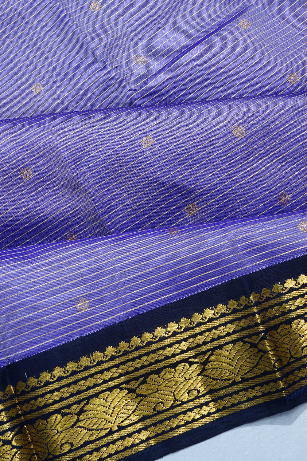 Classic Kanchipuram Silk Oosi Lines And Butta Violet Saree