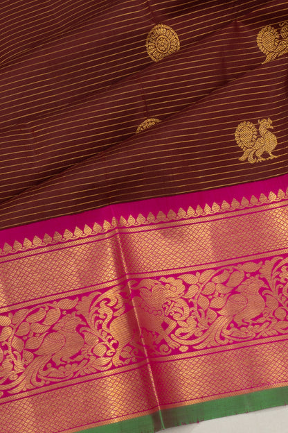 Kanchipuram Silk Oosi Lines And Butta Brown Saree