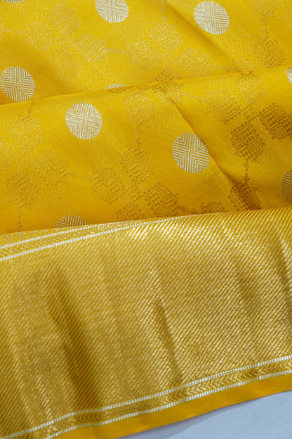 Kanchipuram Silk Jaal And Butta Yellow Saree