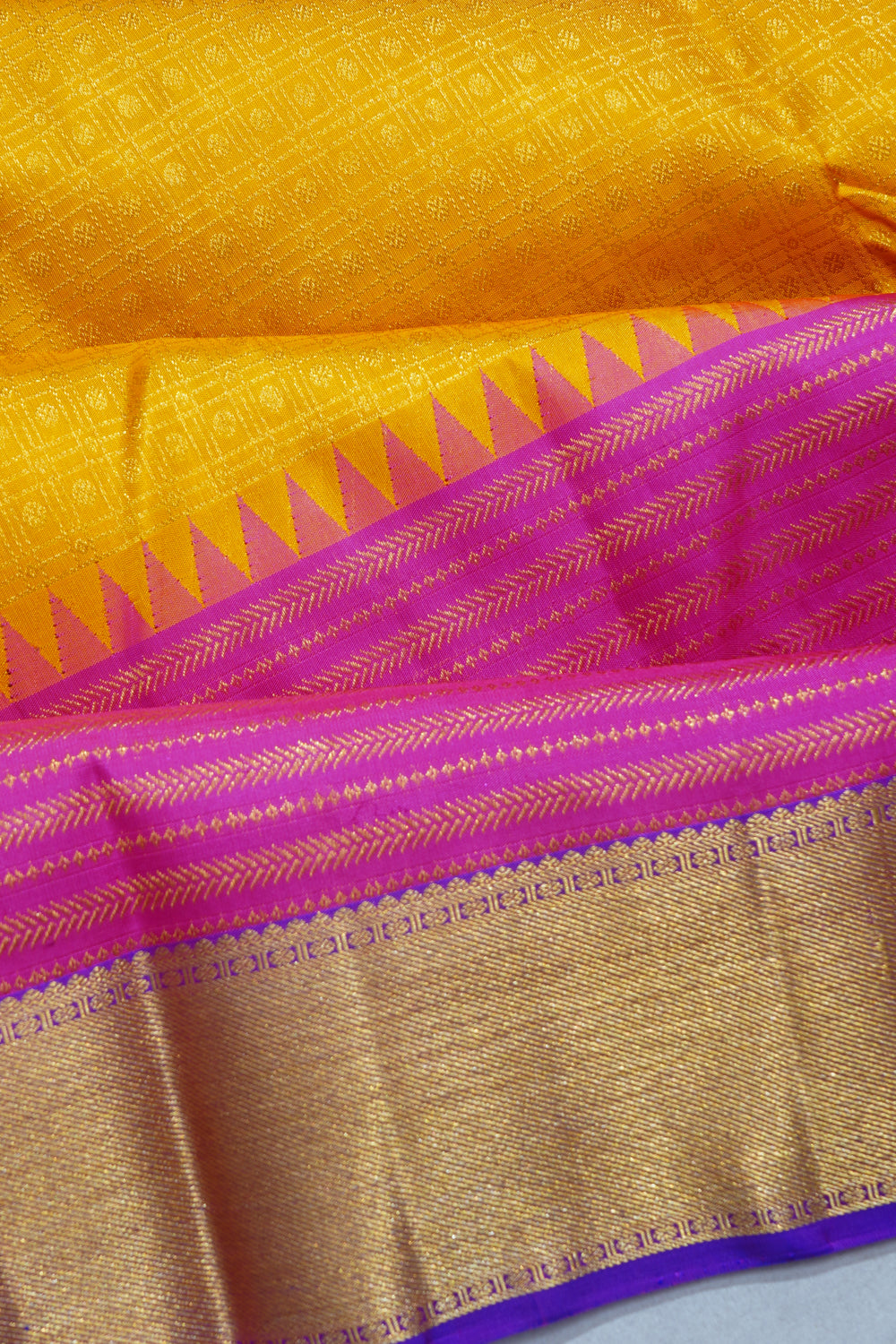 Kanchipuram Silk Checks And Butta Yellow And Pink Saree With Skirt Border