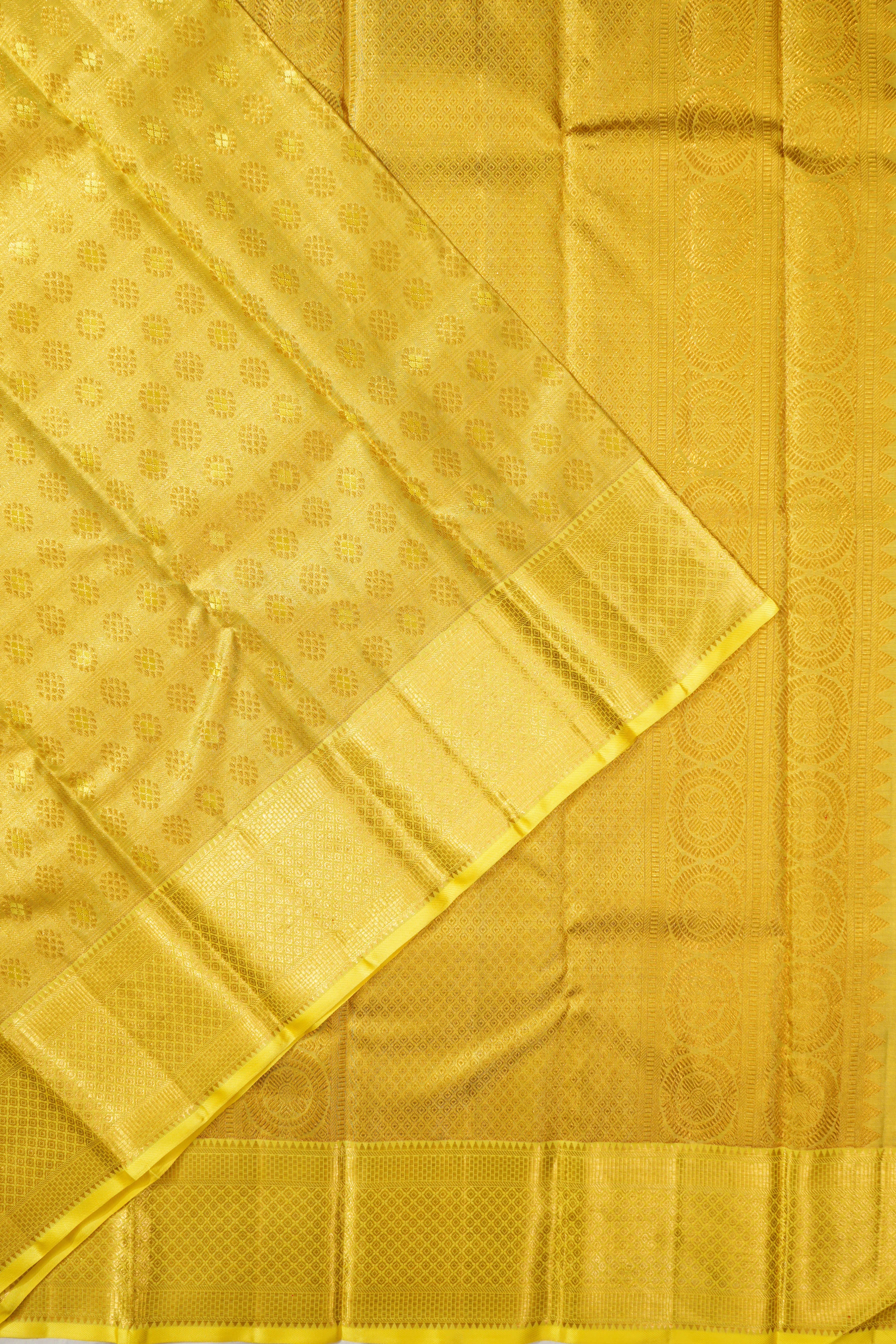 Kanchipuram Silk Tissue Checks And Butta Yellow Saree