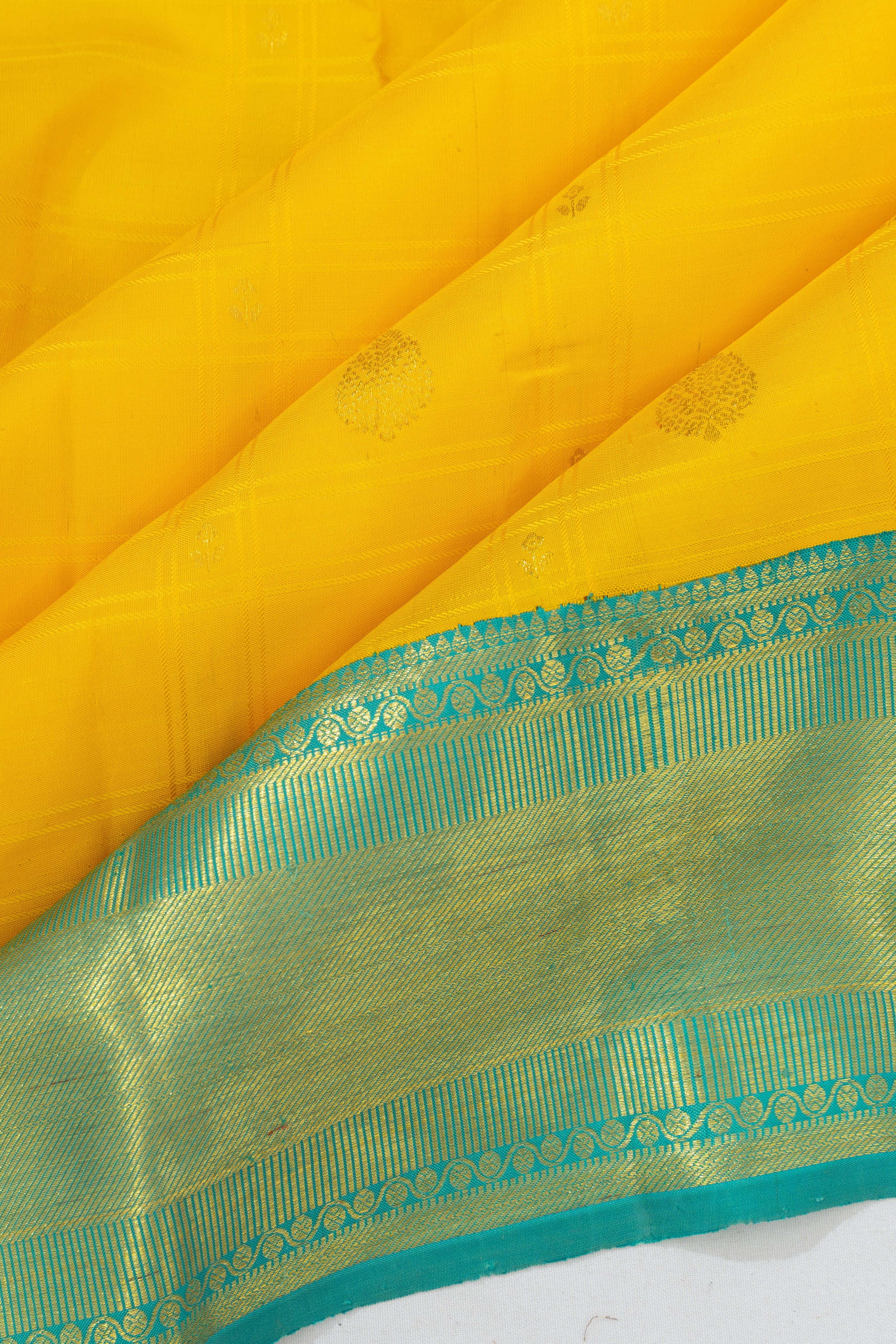 Kanchipuram Silk Checks And Butta Yellow Saree