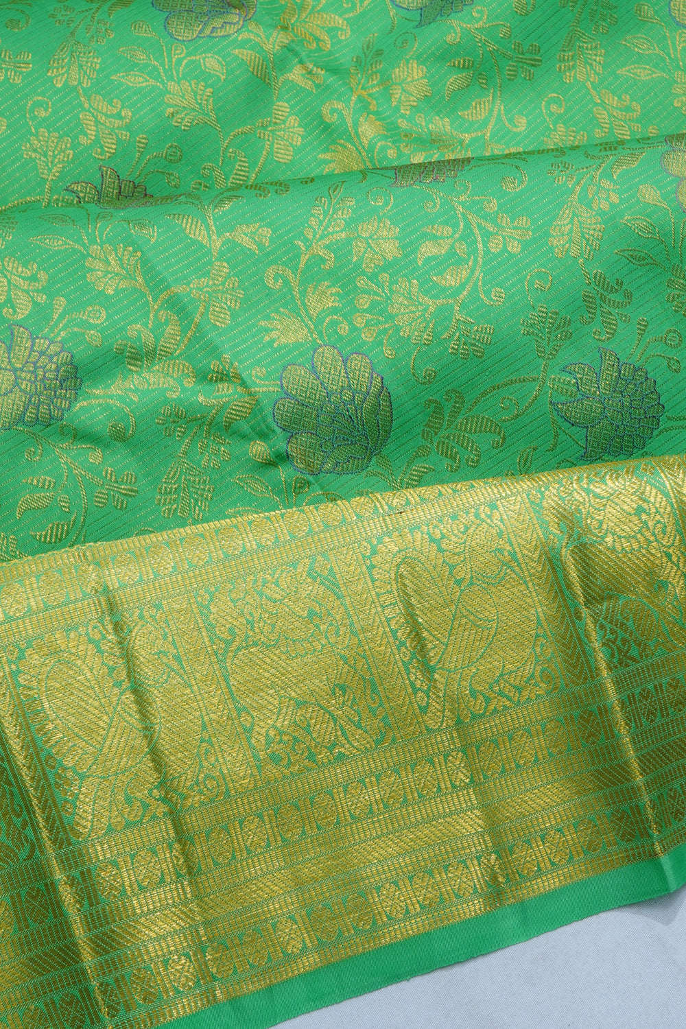 Kanchipuram Silk Oosi Lines Brocade Green Saree