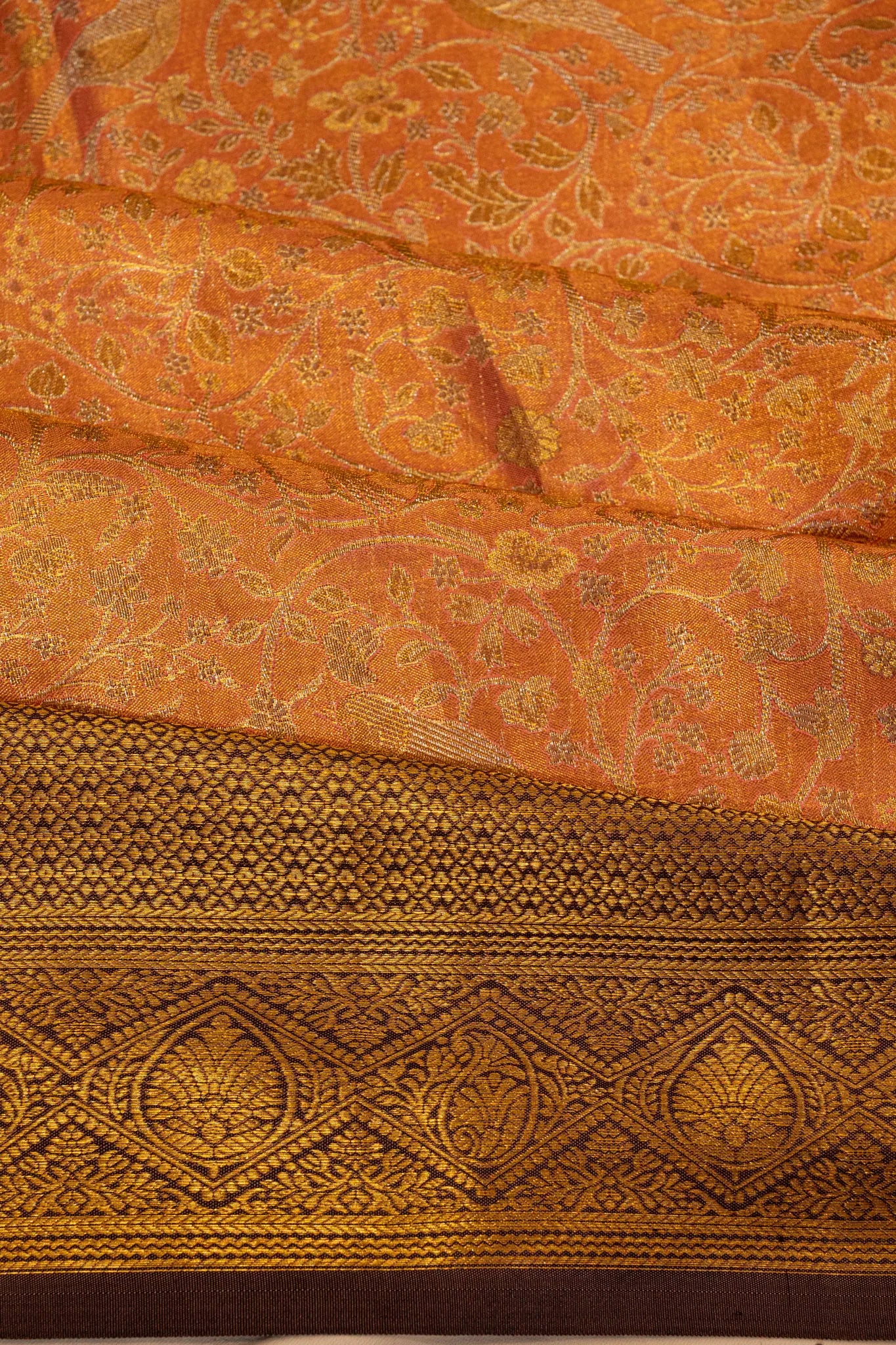 Taranga Kanchi Silk Tissue Brocade Orange Saree