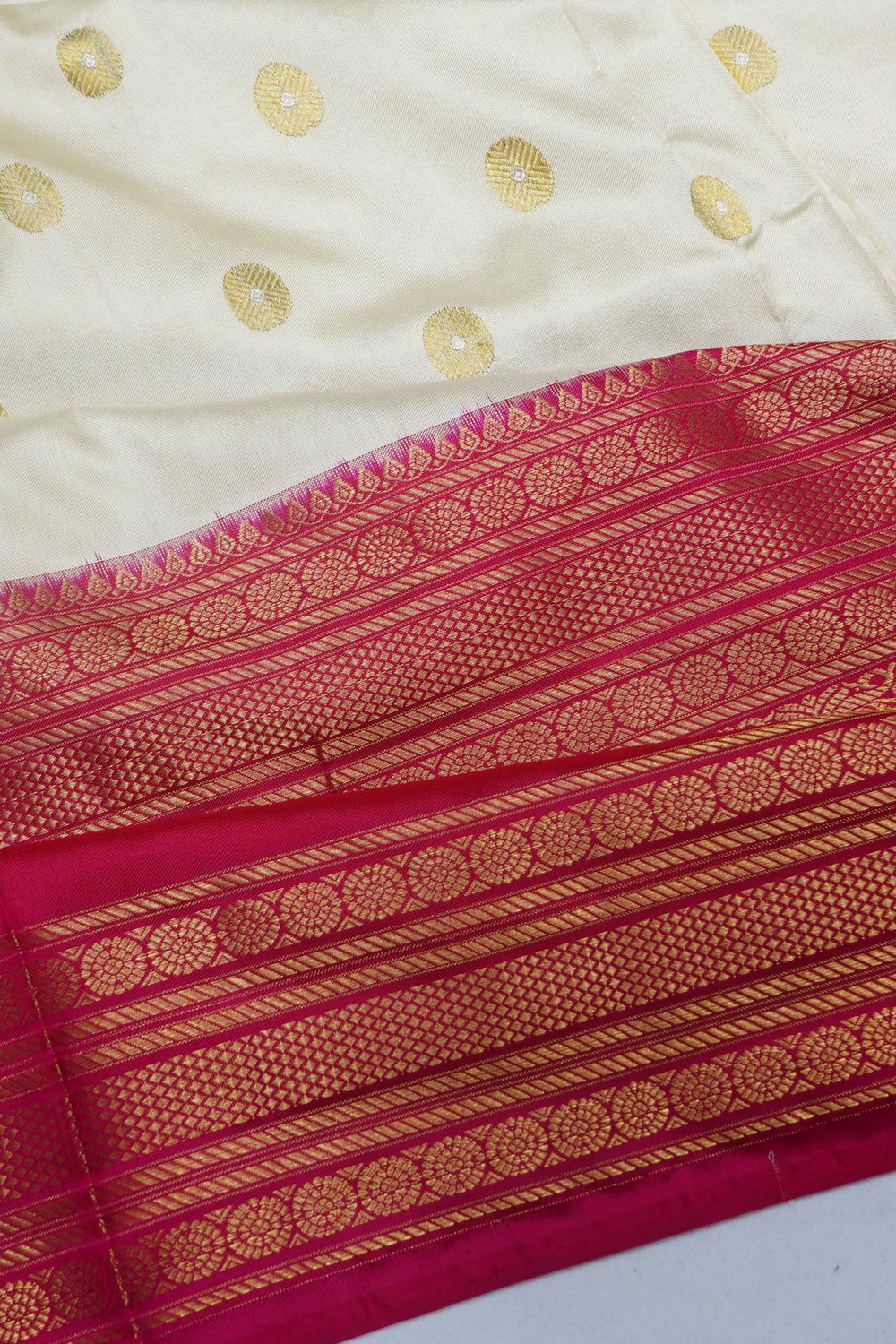 Kanchipuram Silk Butta White Saree With Ikat Blouse