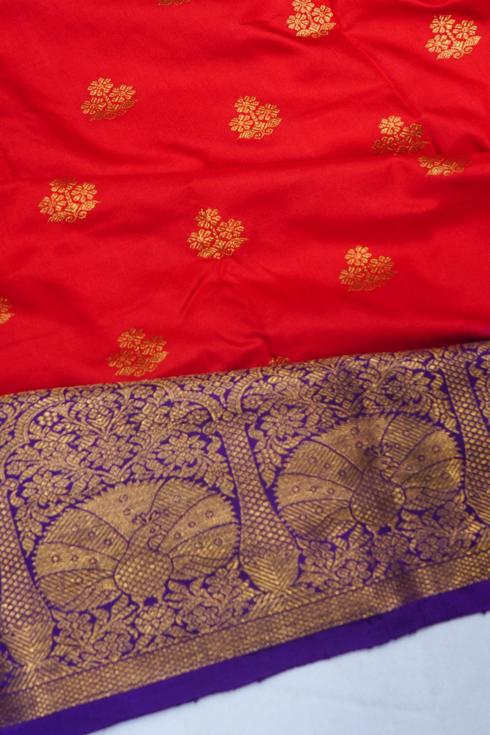 Kanchipuram Silk Butta Red Saree With Ikat Blouse