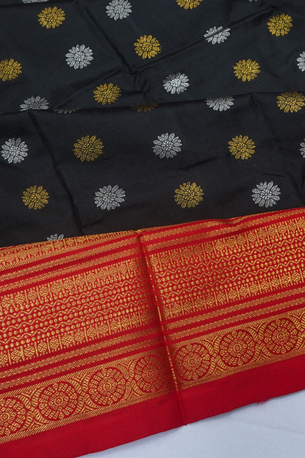 Kanchipuram Silk Butta Black Saree With Ikat Blouse