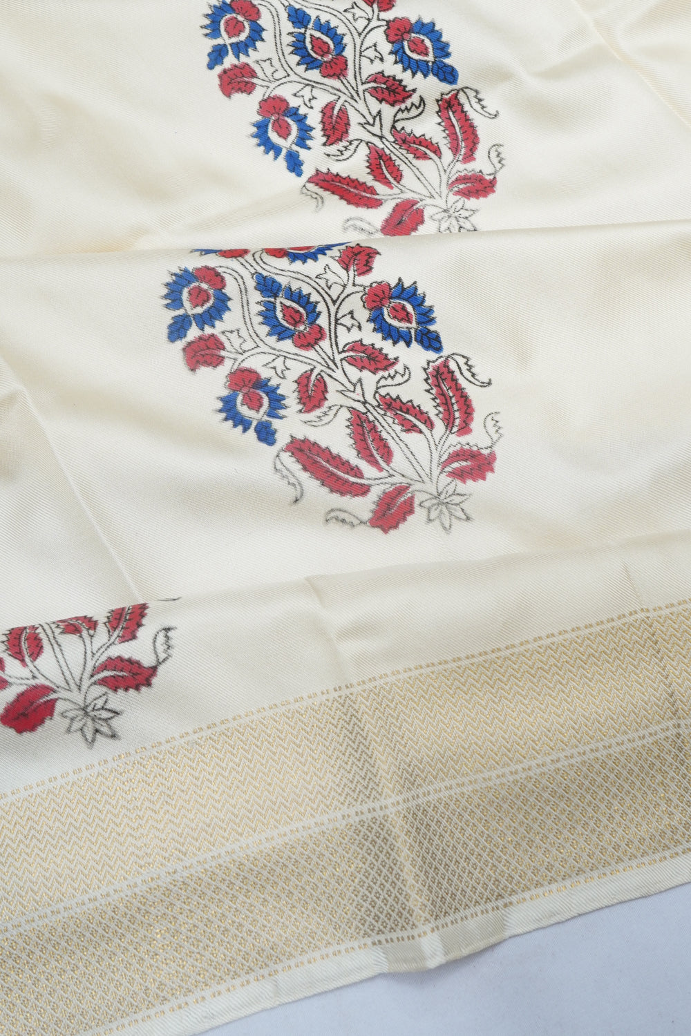 Kanchipuram Silk Twill Block Print Butta White Saree With Ikat Blouse