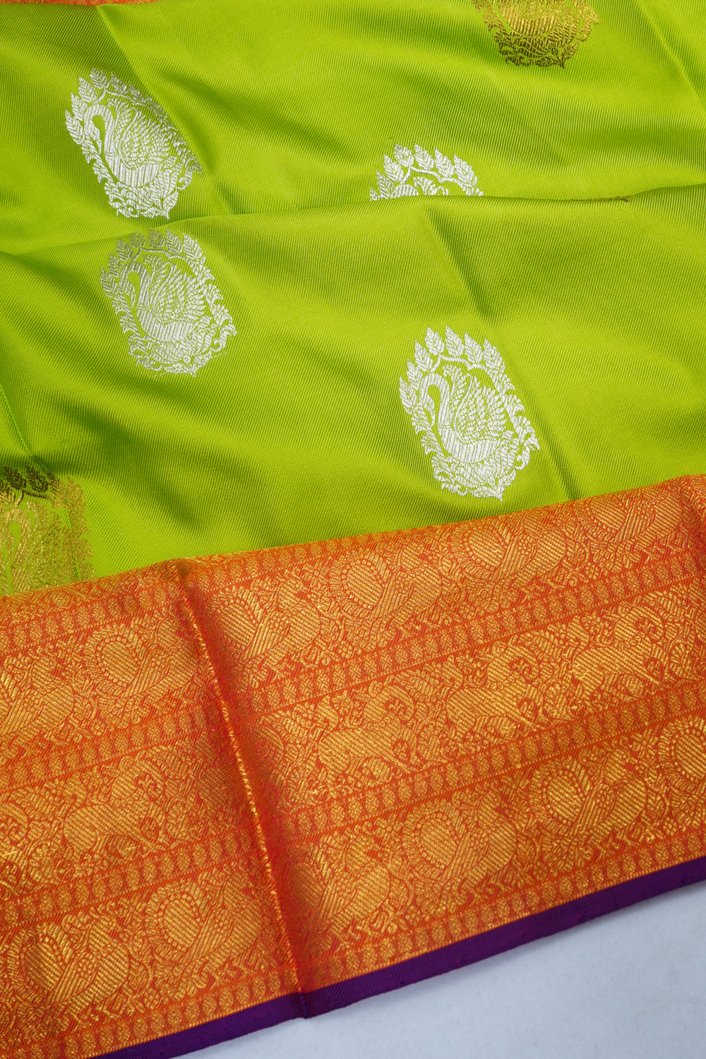 Kanchipuram Silk Twill Butta Parrot Green Saree With Ikat Blouse