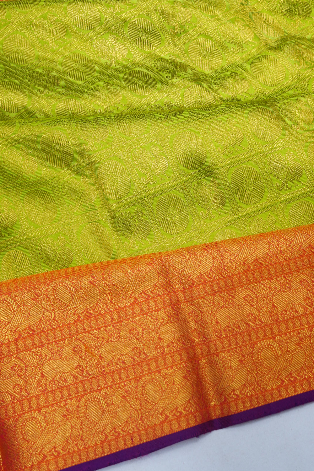 Kanchipuram Silk Twill Checks And Butta Parrot Green Saree With Ikat Blouse