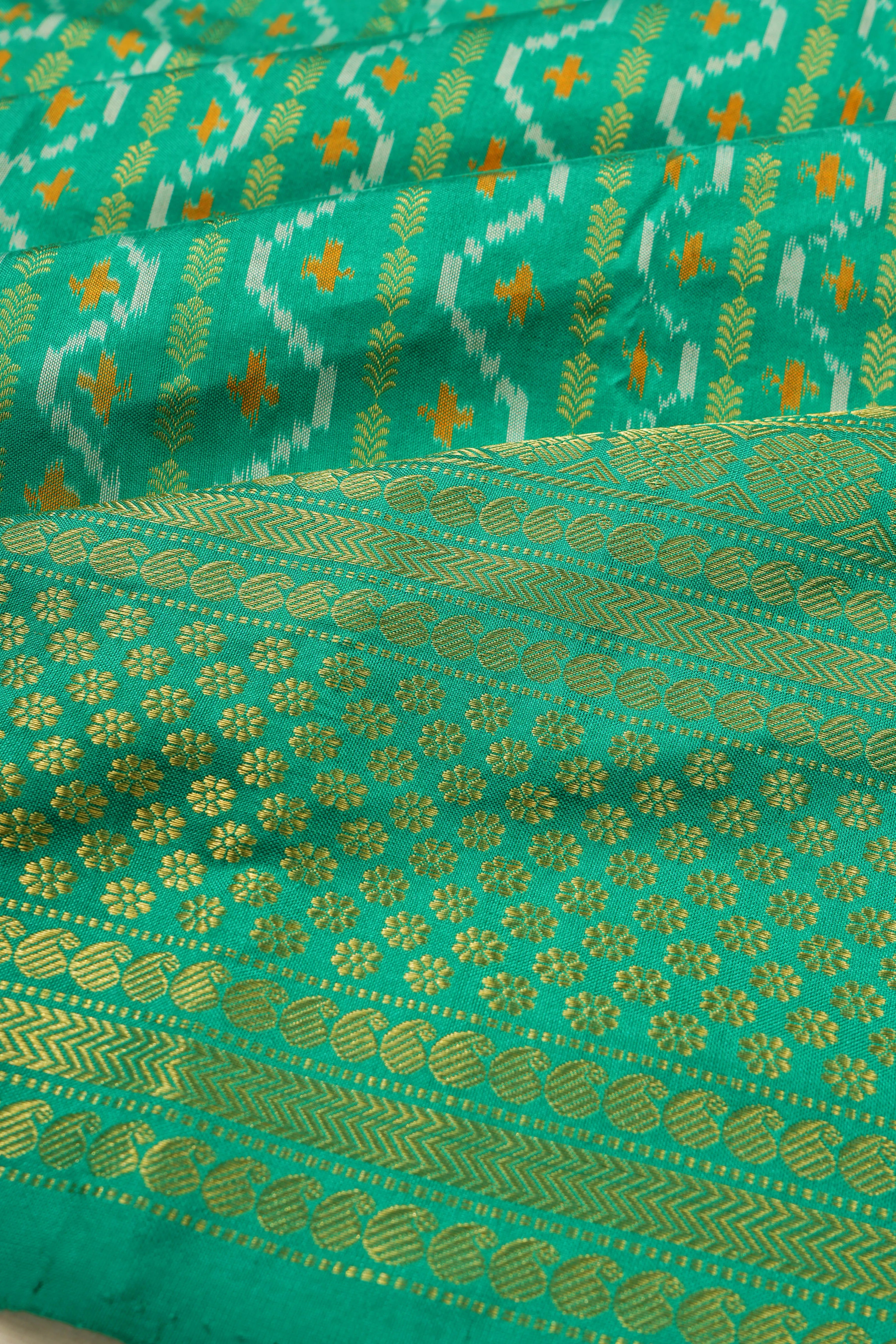 Kanchipuram Silk Ikat And Vertical Lines Sea Green Saree