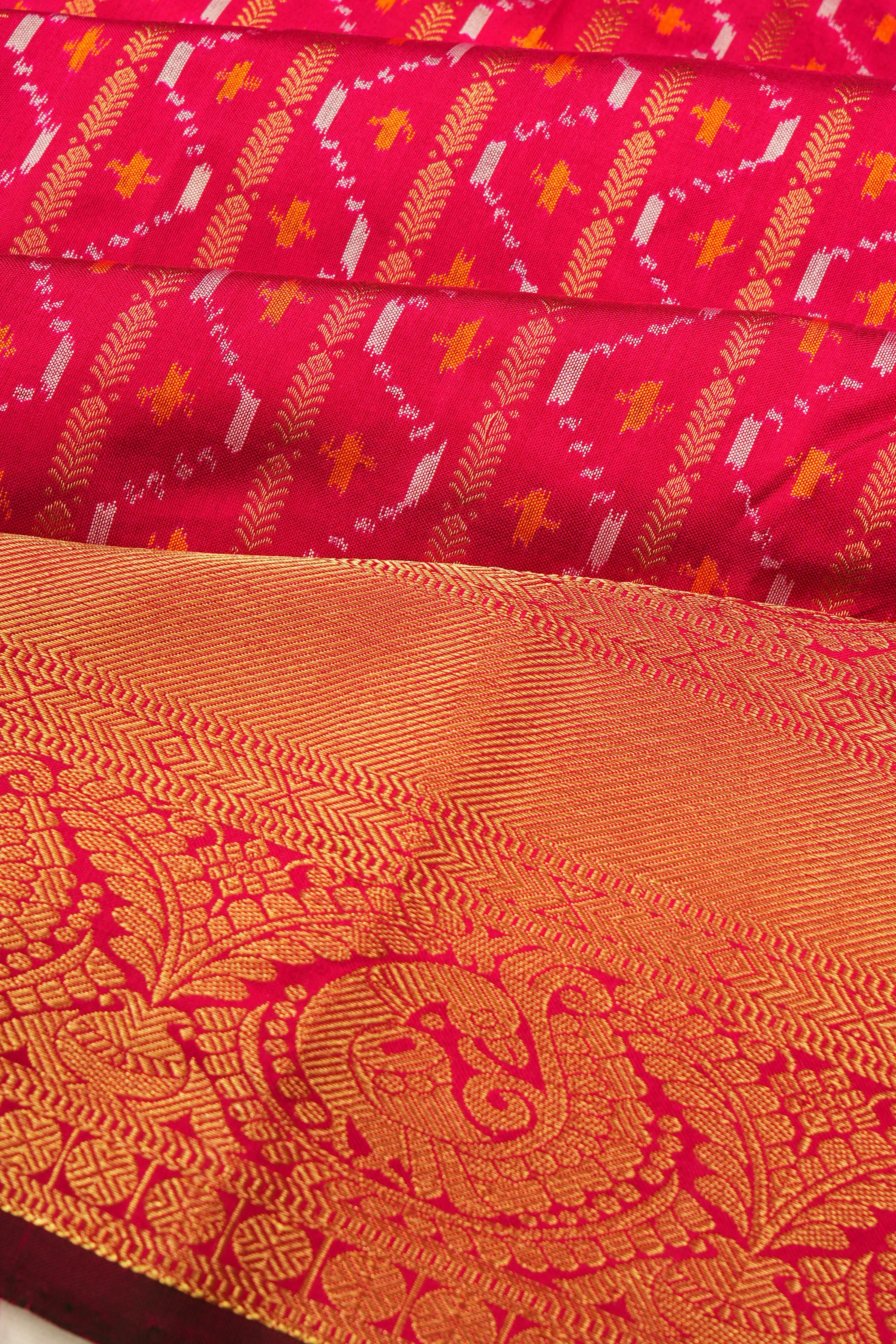 Kanchipuram Silk Ikat And Vertical Lines Reddish Pink Saree