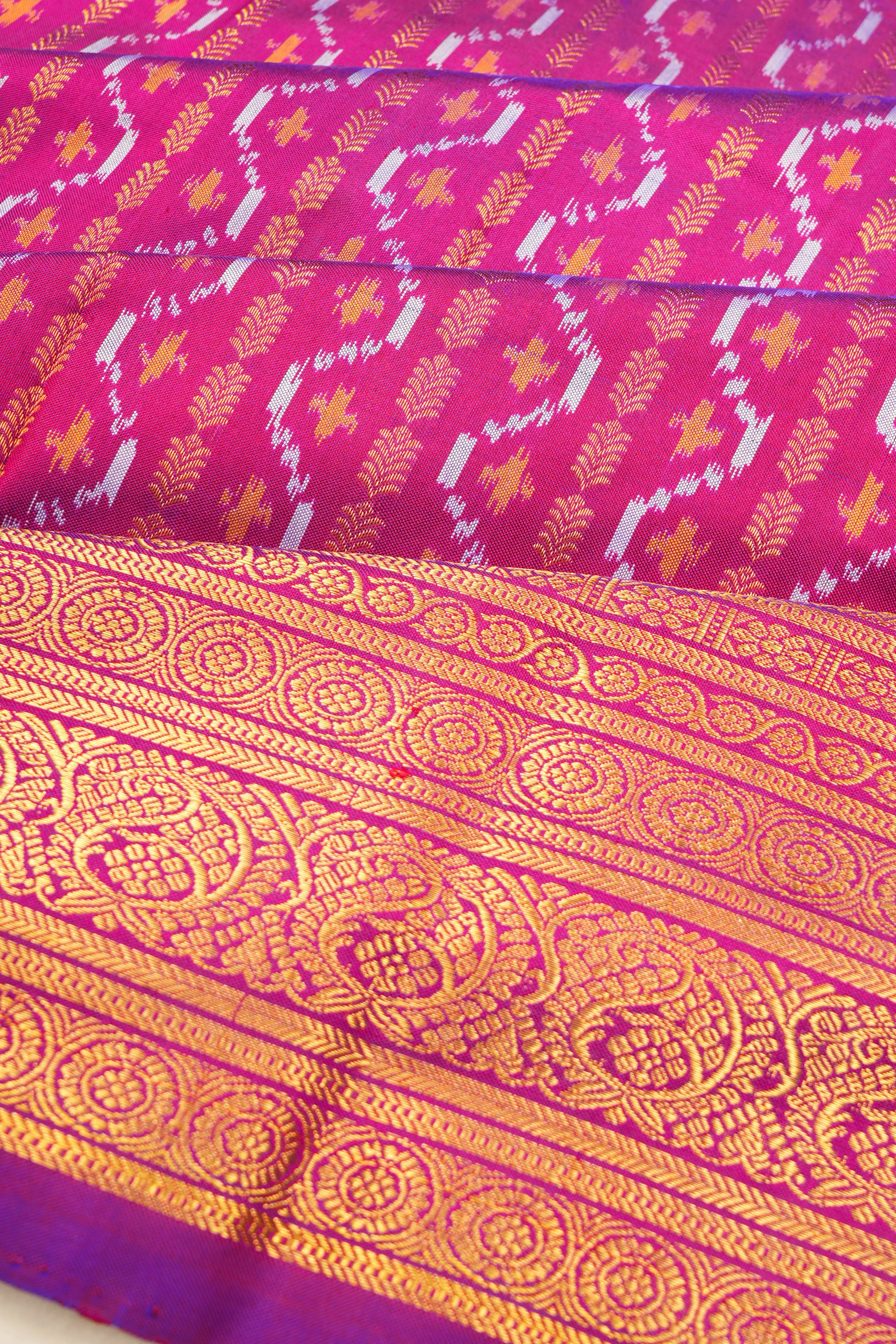 Kanchipuram Silk Ikat And Vertical Lines Rani Pink Saree