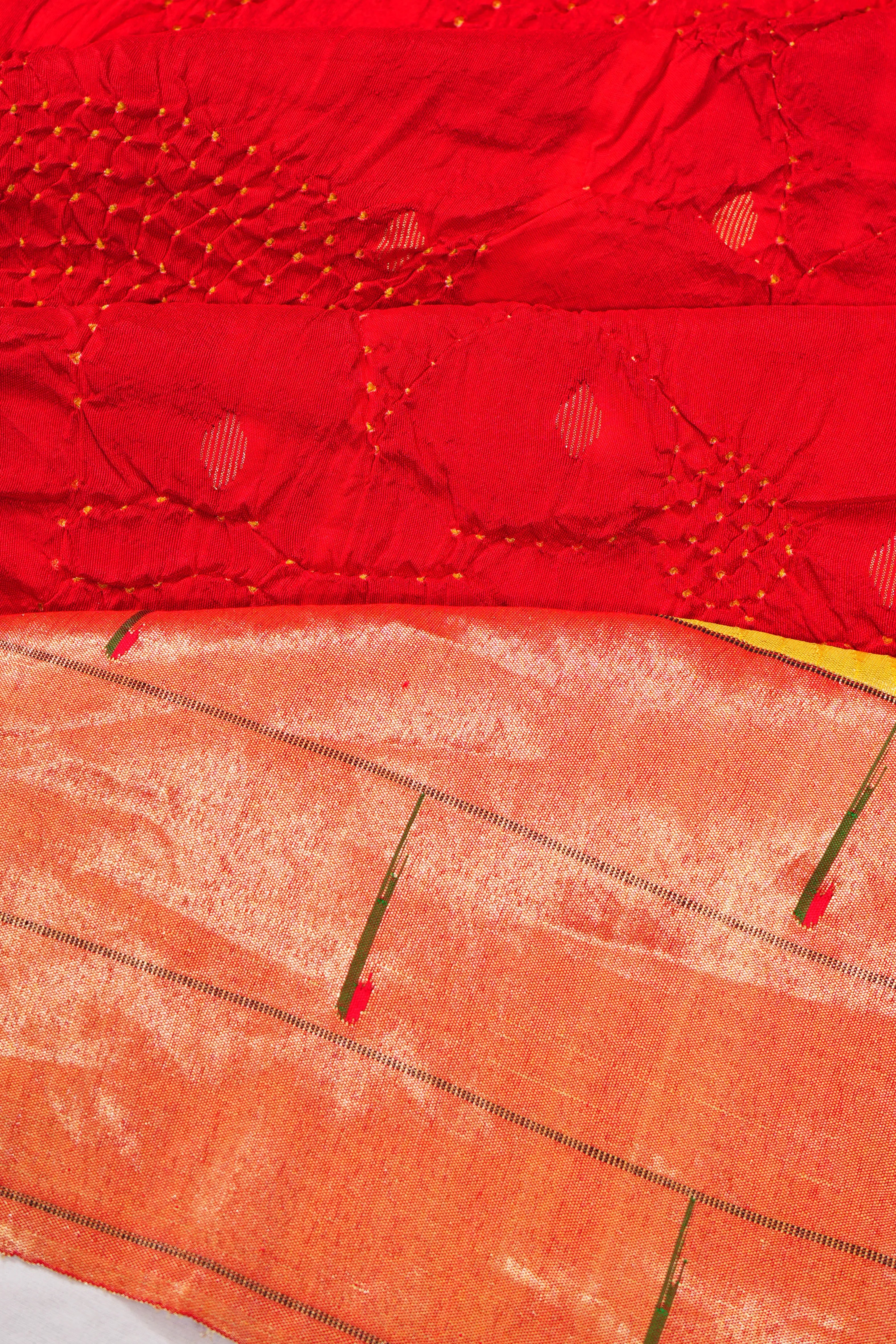 Paithani Silk Bandhani And Butta Red Saree With Triple Muniya Border