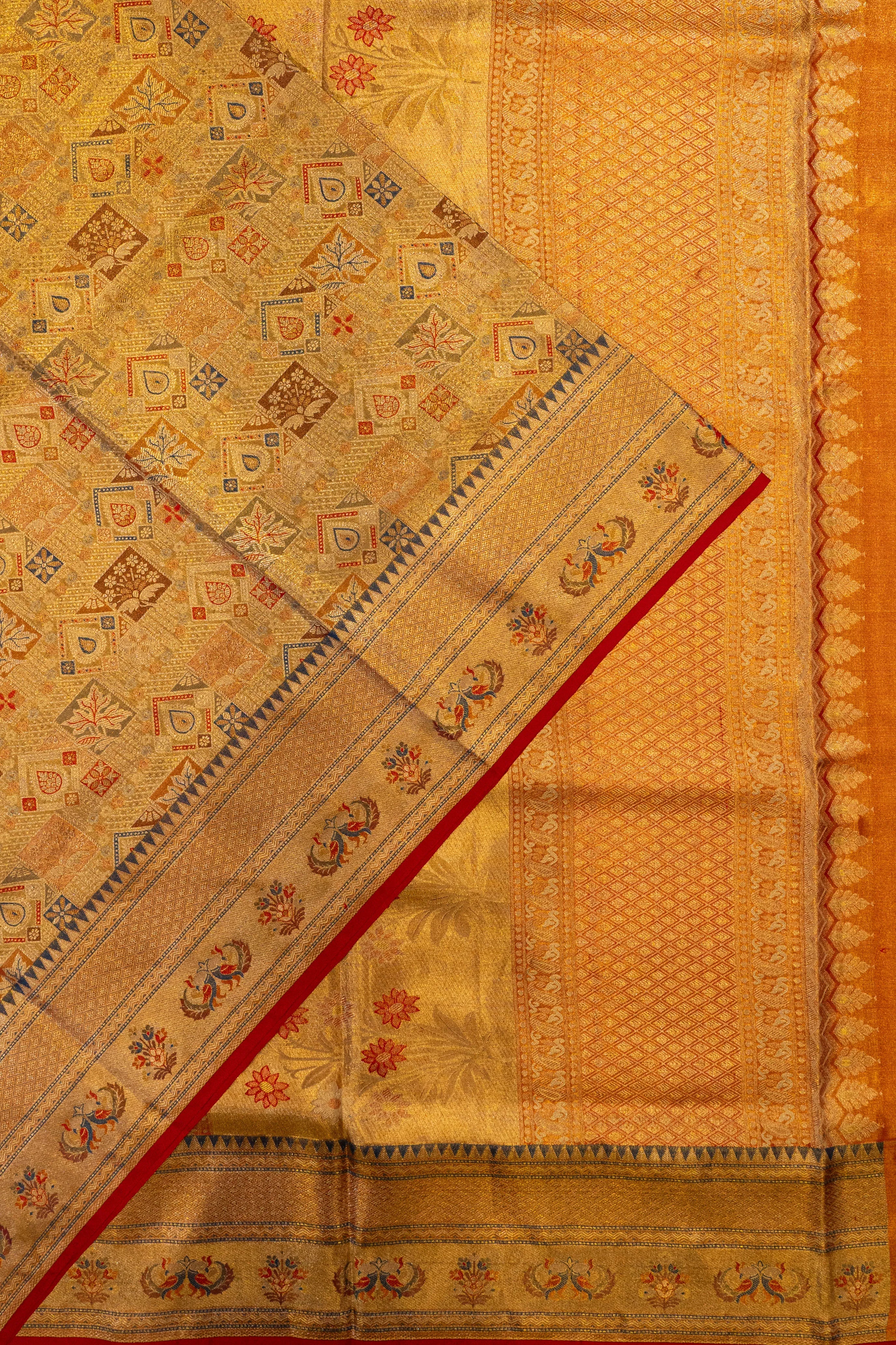 Taranga Kanchi Silk Tissue Brocade Gold Saree