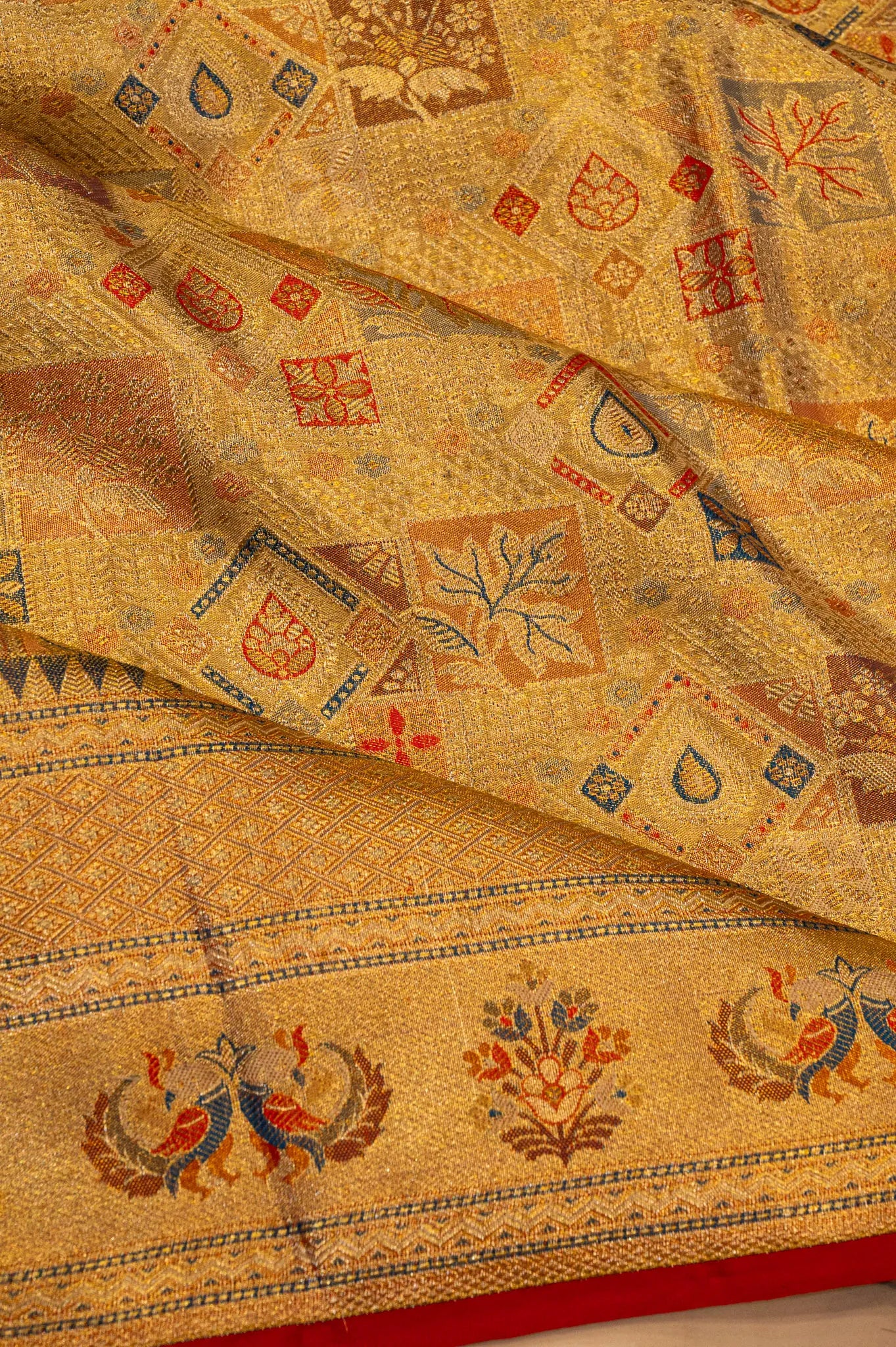 Taranga Kanchi Silk Tissue Brocade Gold Saree
