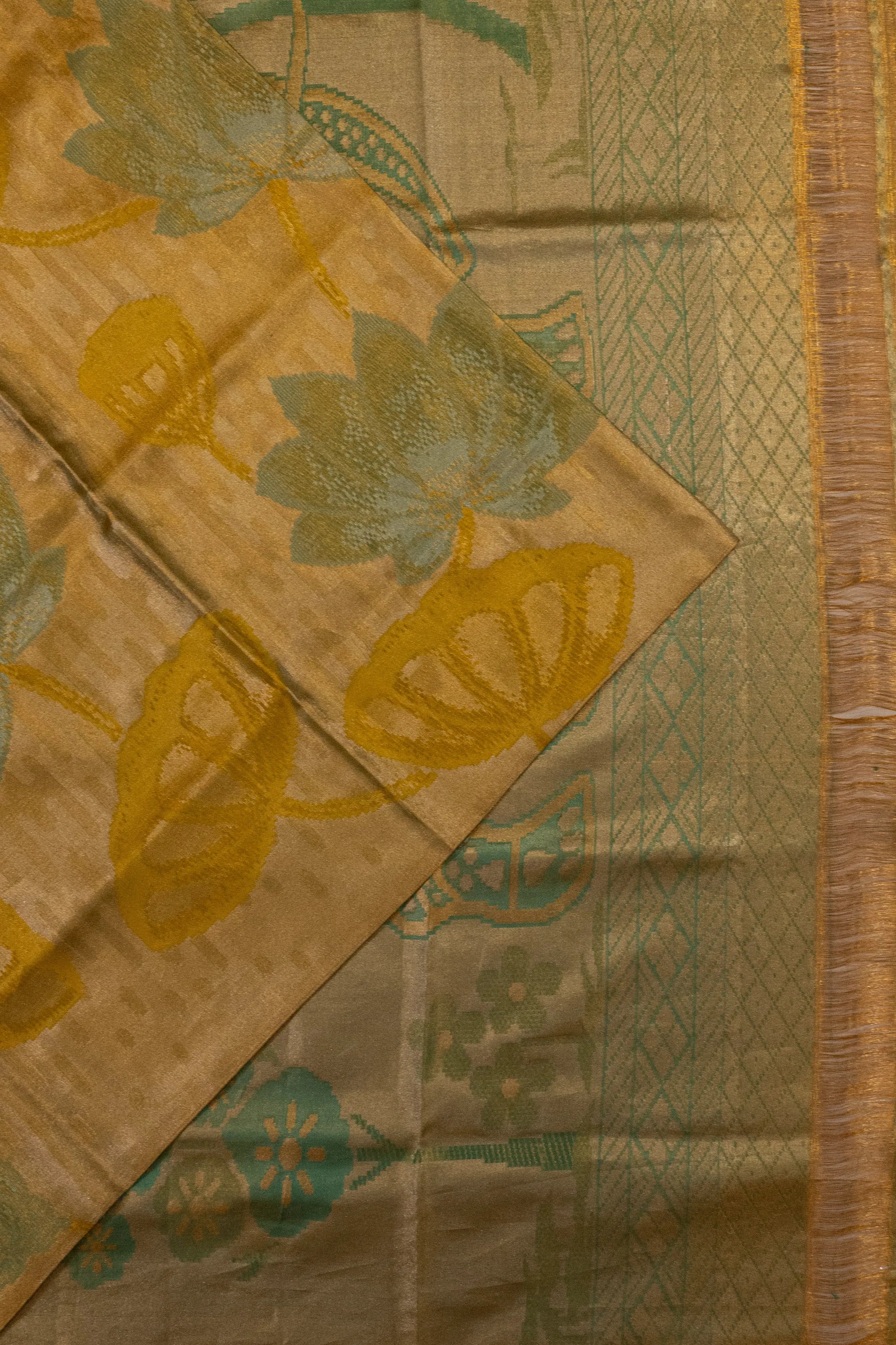 Taranga Kanchi Silk Tissue Brocade Gold Saree