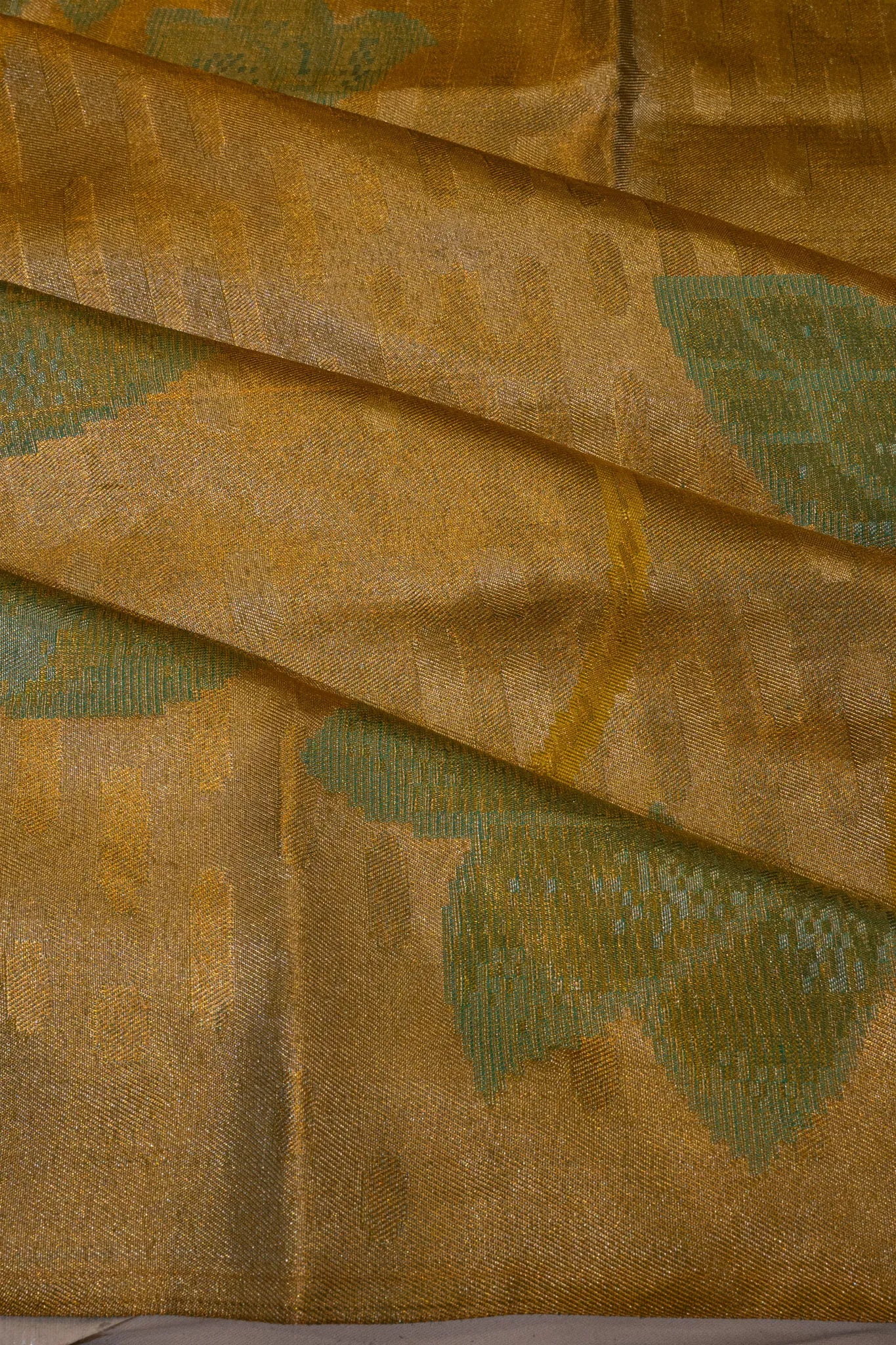 Taranga Kanchi Silk Tissue Brocade Gold Saree