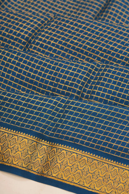 georgette-crepe-checks-teal-blue-saree-with-kalamkari-border-1215372835