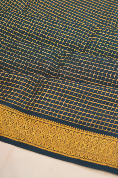 georgette-crepe-checks-dark-blue-saree-with-kalamkari-border-1215372839