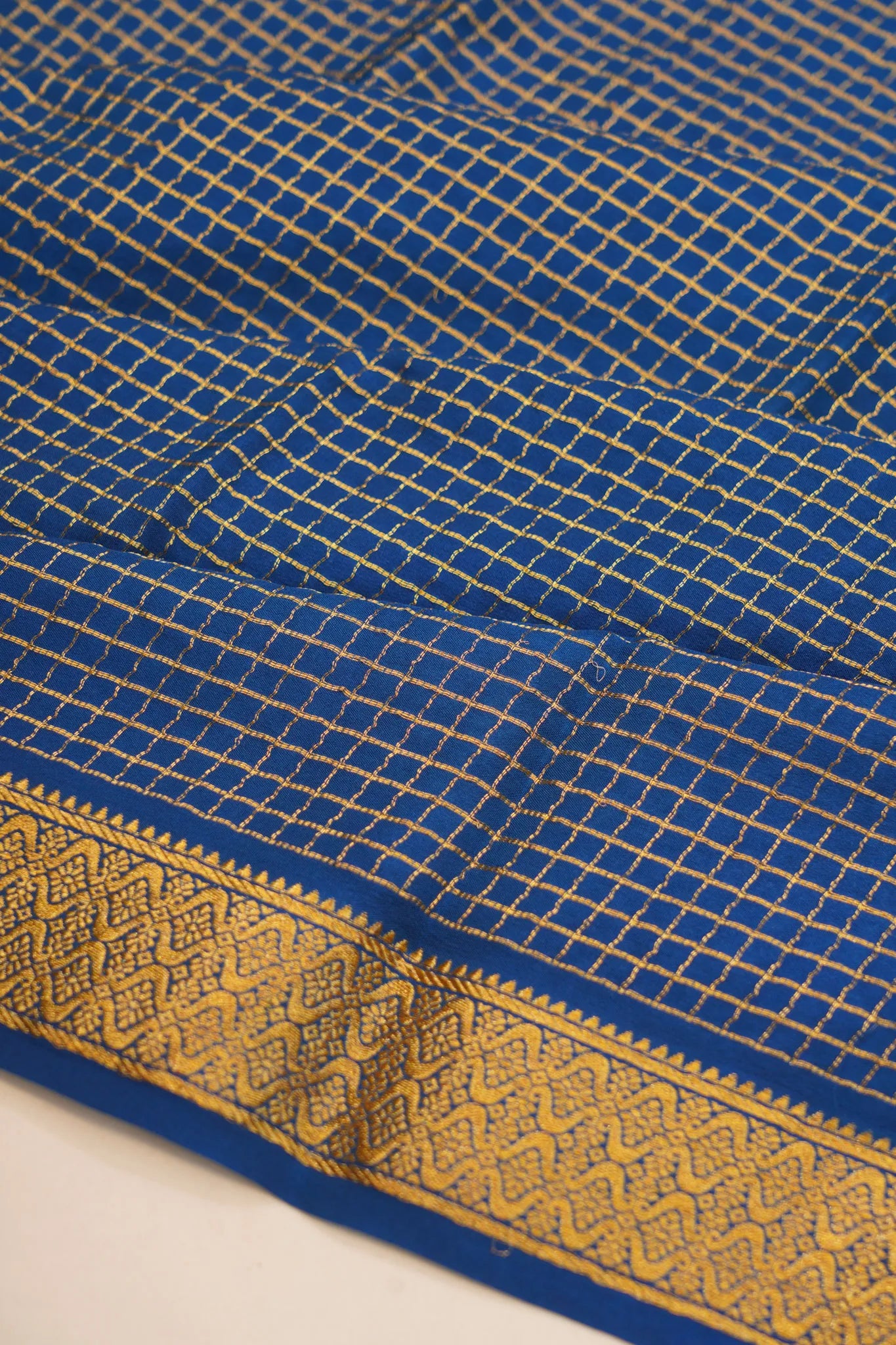 georgette-crepe-checks-blue-saree-with-kalamkari-border-1215372842