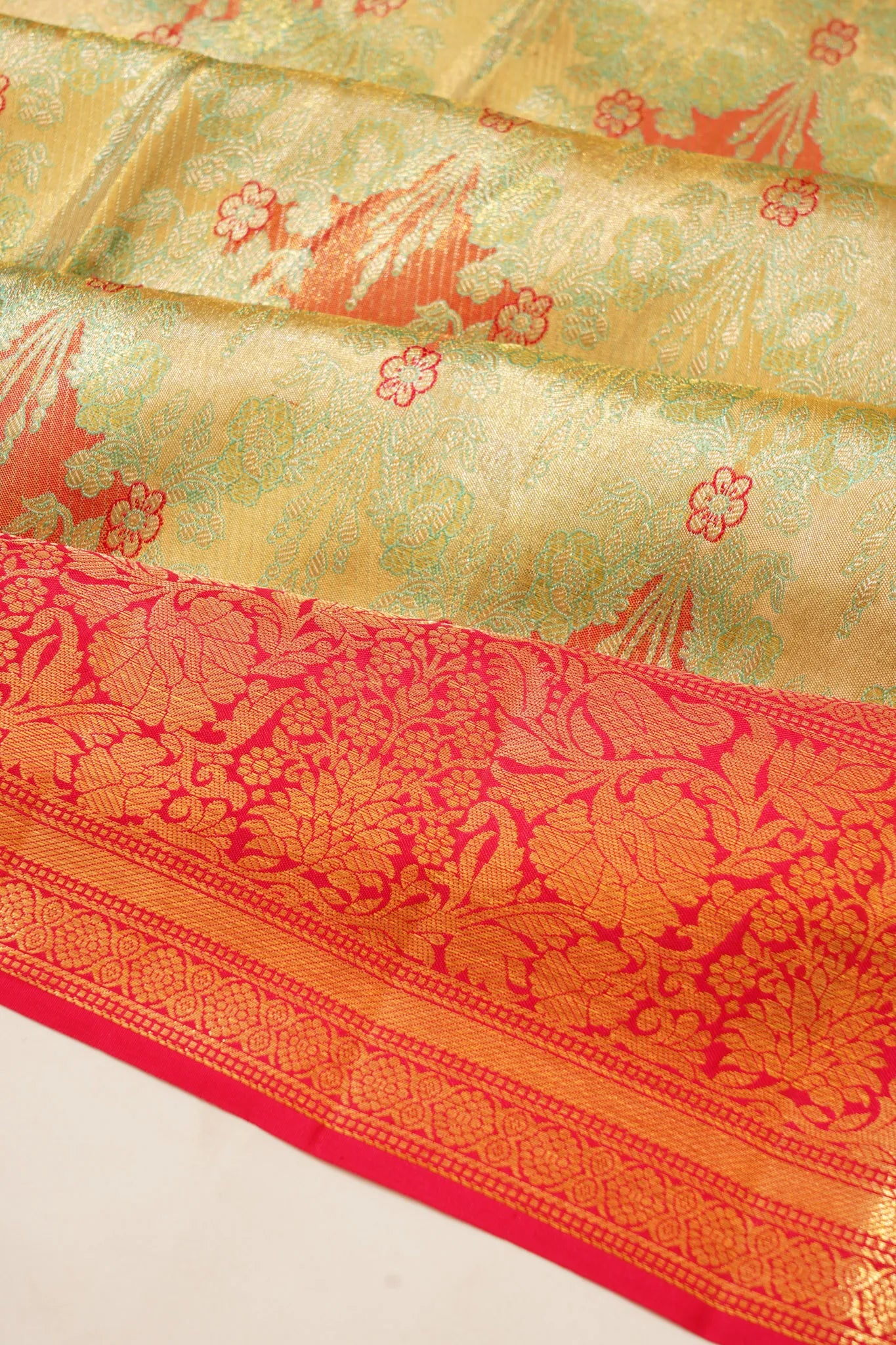 taranga-kanchi-silk-tissue-brocade-green-saree-1215374394