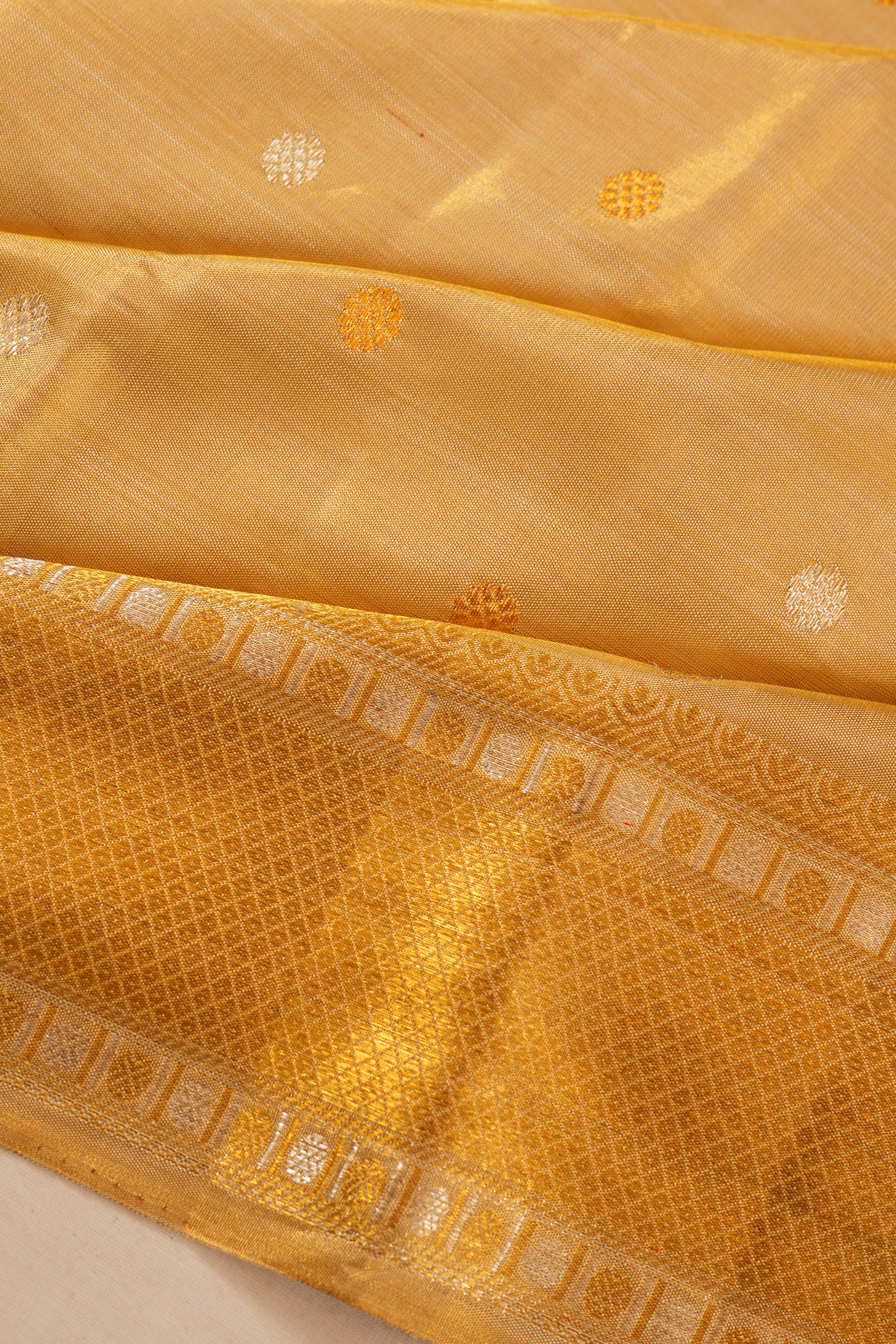 Kanchipuram Silk Tissue Butta Gold Saree
