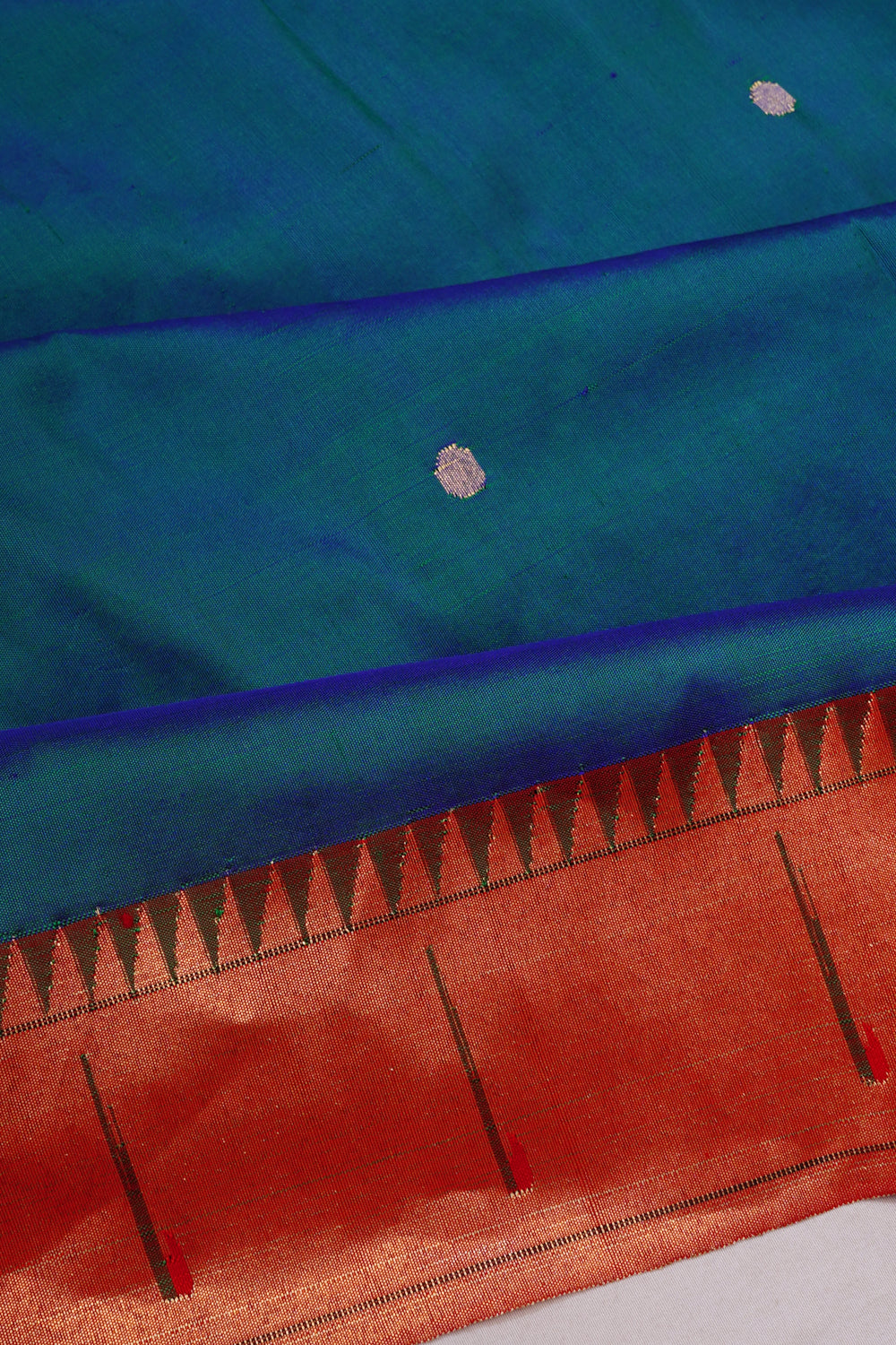 Paithani Silk Butta Teal Blue Saree With Muniya Border