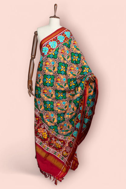 Patan Patola Silk Double Ikat Green And Orange Saree