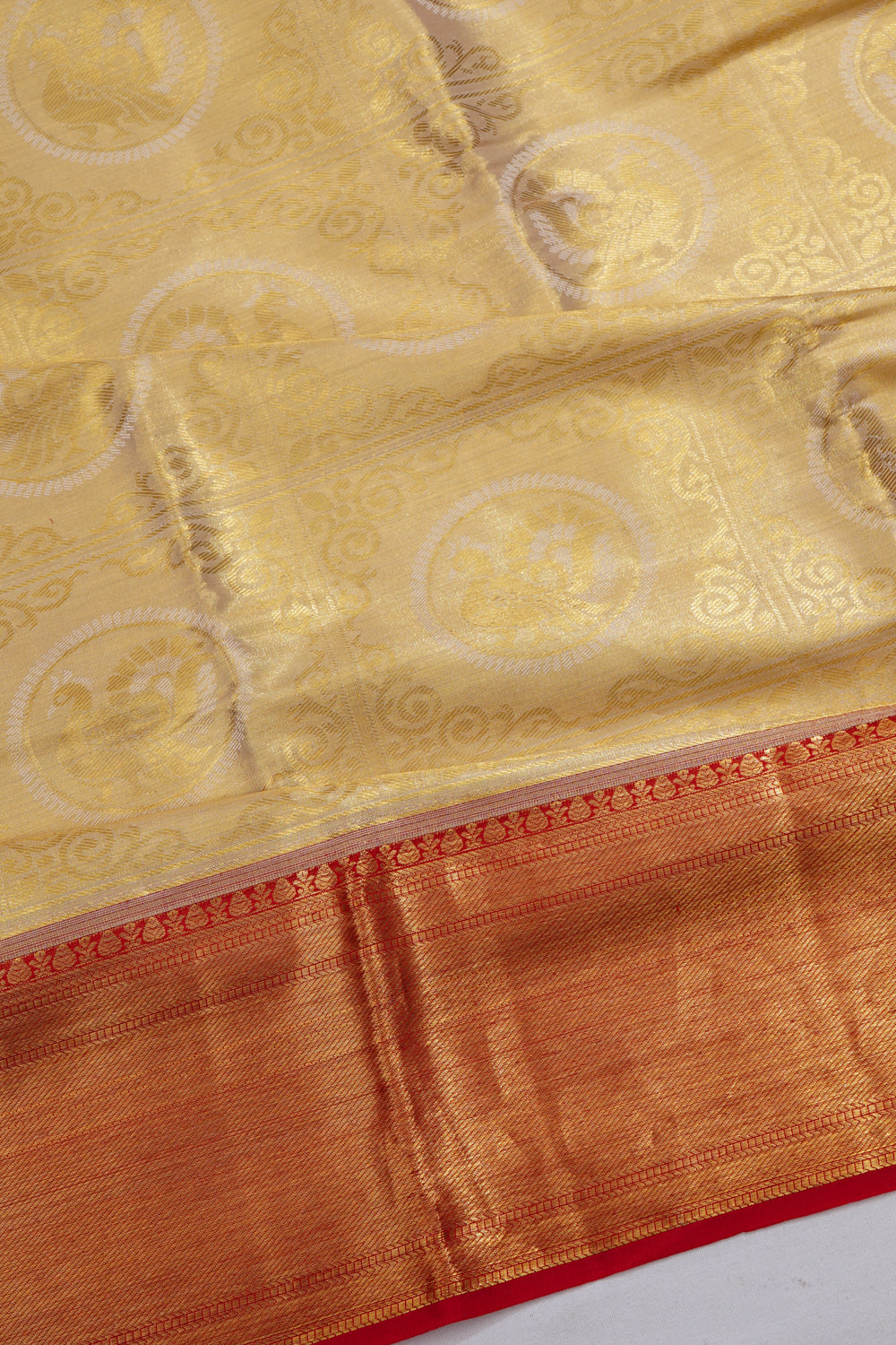 Taranga Kanchi Silk Tissue Brocade Gold Saree