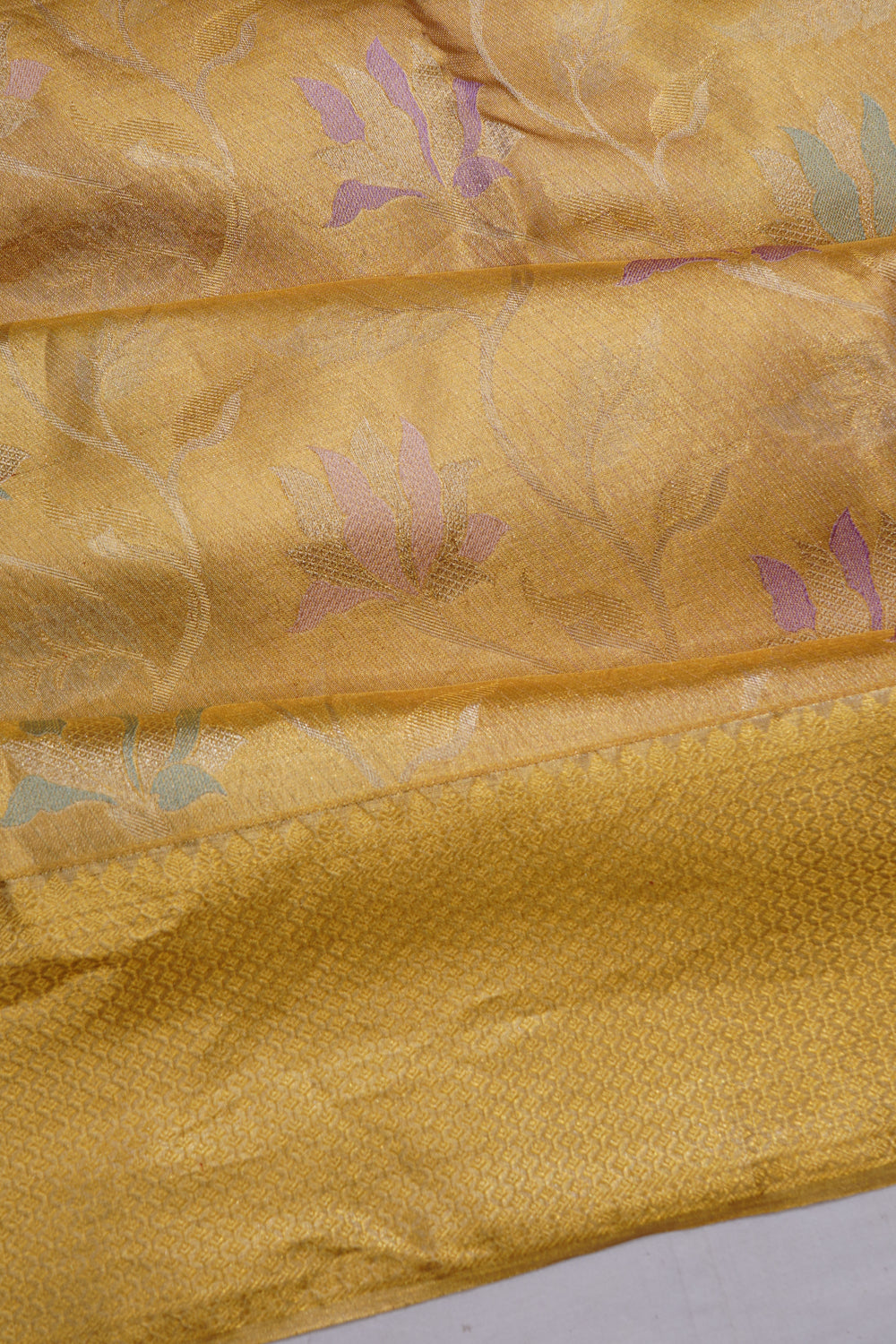 Taranga Kanchi Silk Tissue Jaal Gold Saree
