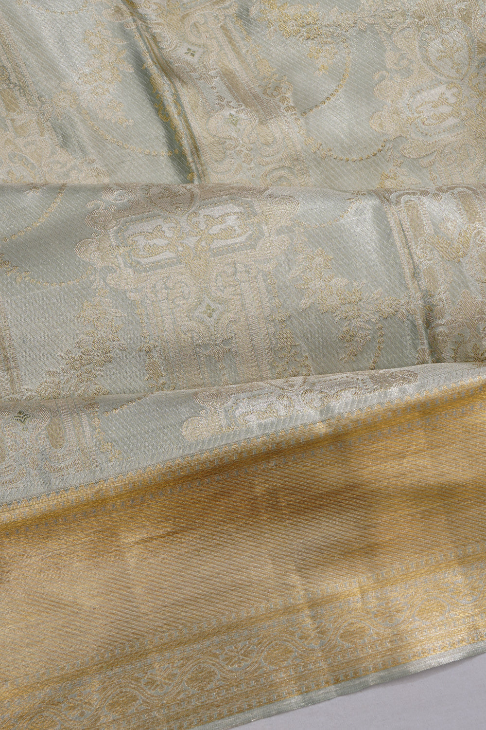 Taranga Kanchi Silk Tissue Brocade Grey Saree