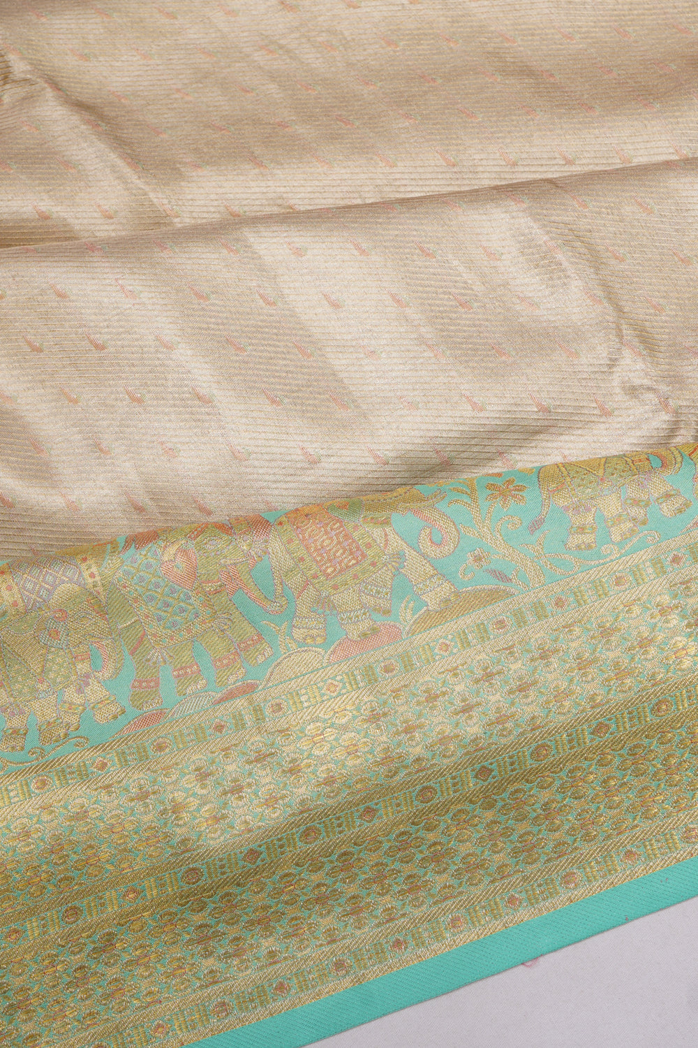 Kanchipuram Silk Tissue And Butta Silver Saree