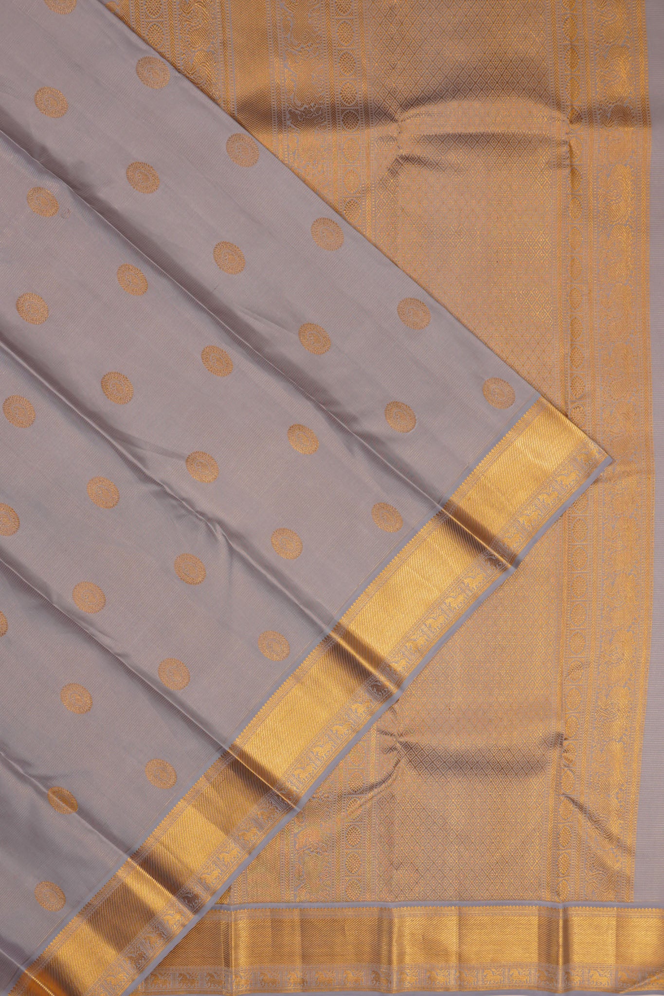 Kanchipuram Silk Oosi Lines And Butta Grey Saree
