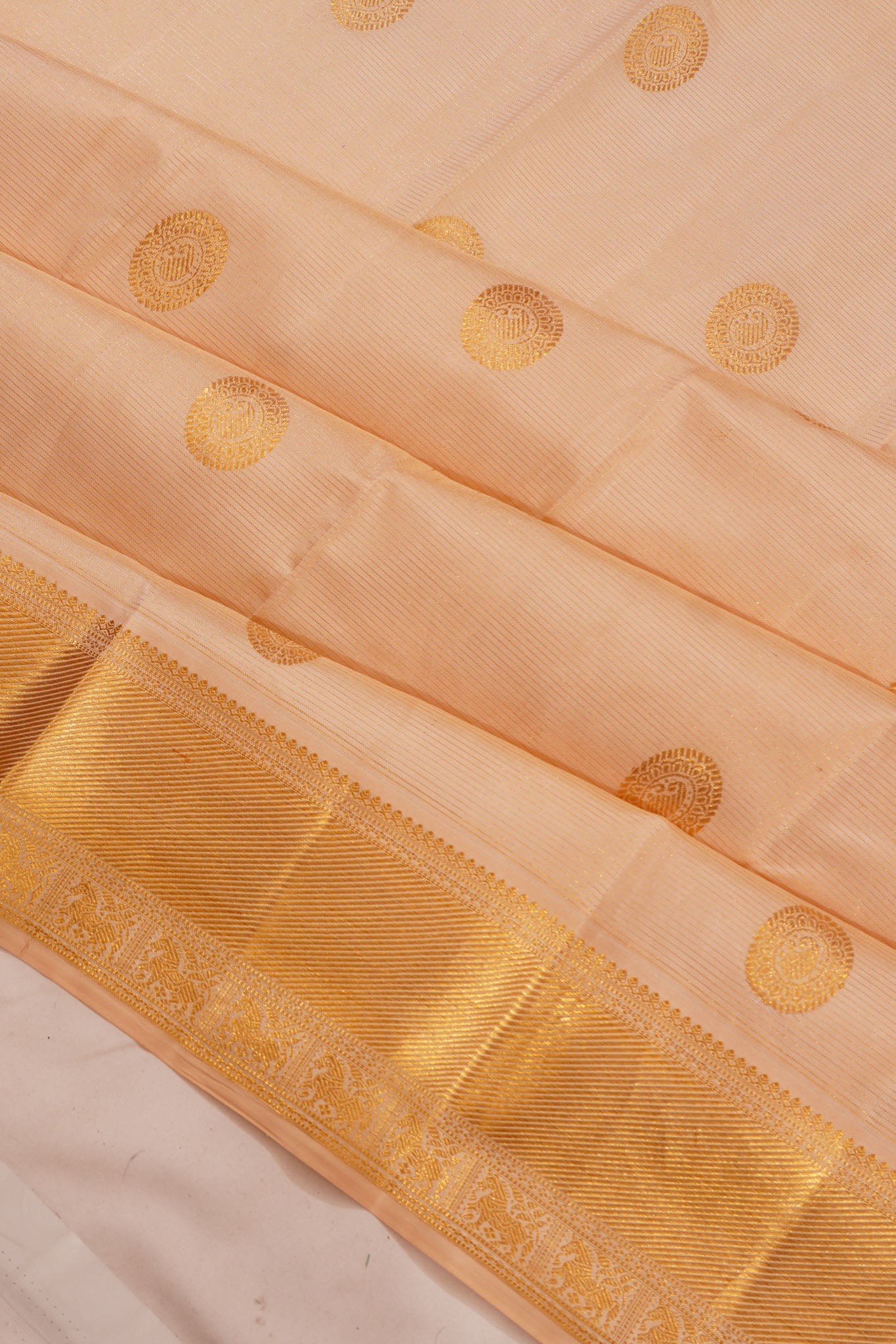 Kanchipuram Silk Oosi Lines And Butta Peach Saree