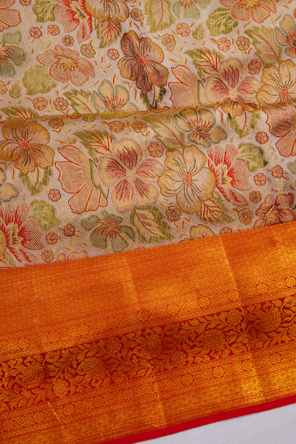 Taranga Kanchi Silk Tissue Brocade Gold Saree