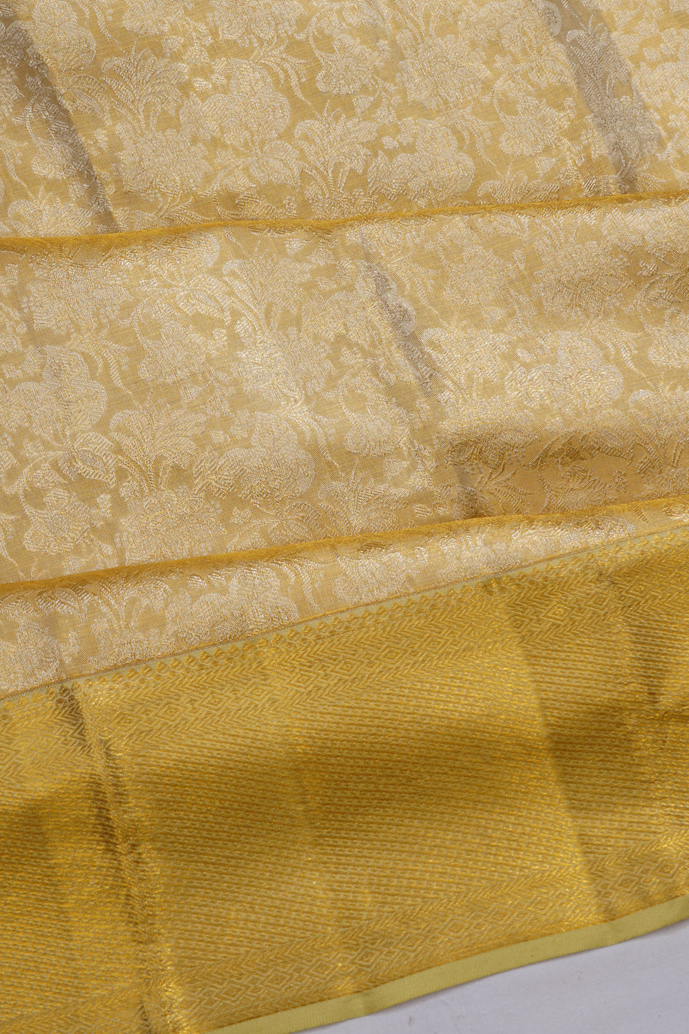 Taranga Kanchi Silk Tissue Brocade Gold Saree